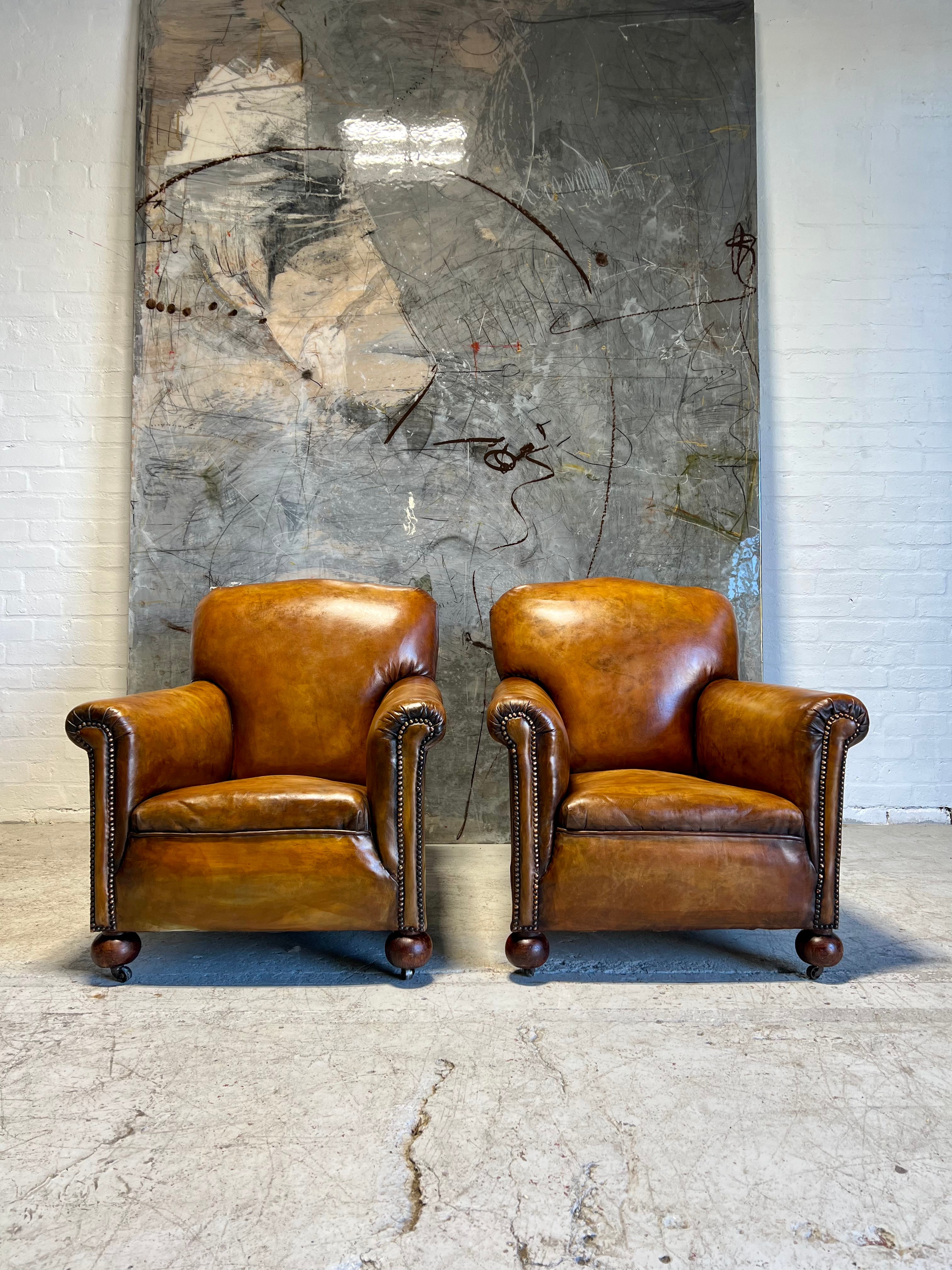 A Stunning Matching Pair of Hand Dyed Art Deco Club Chairs