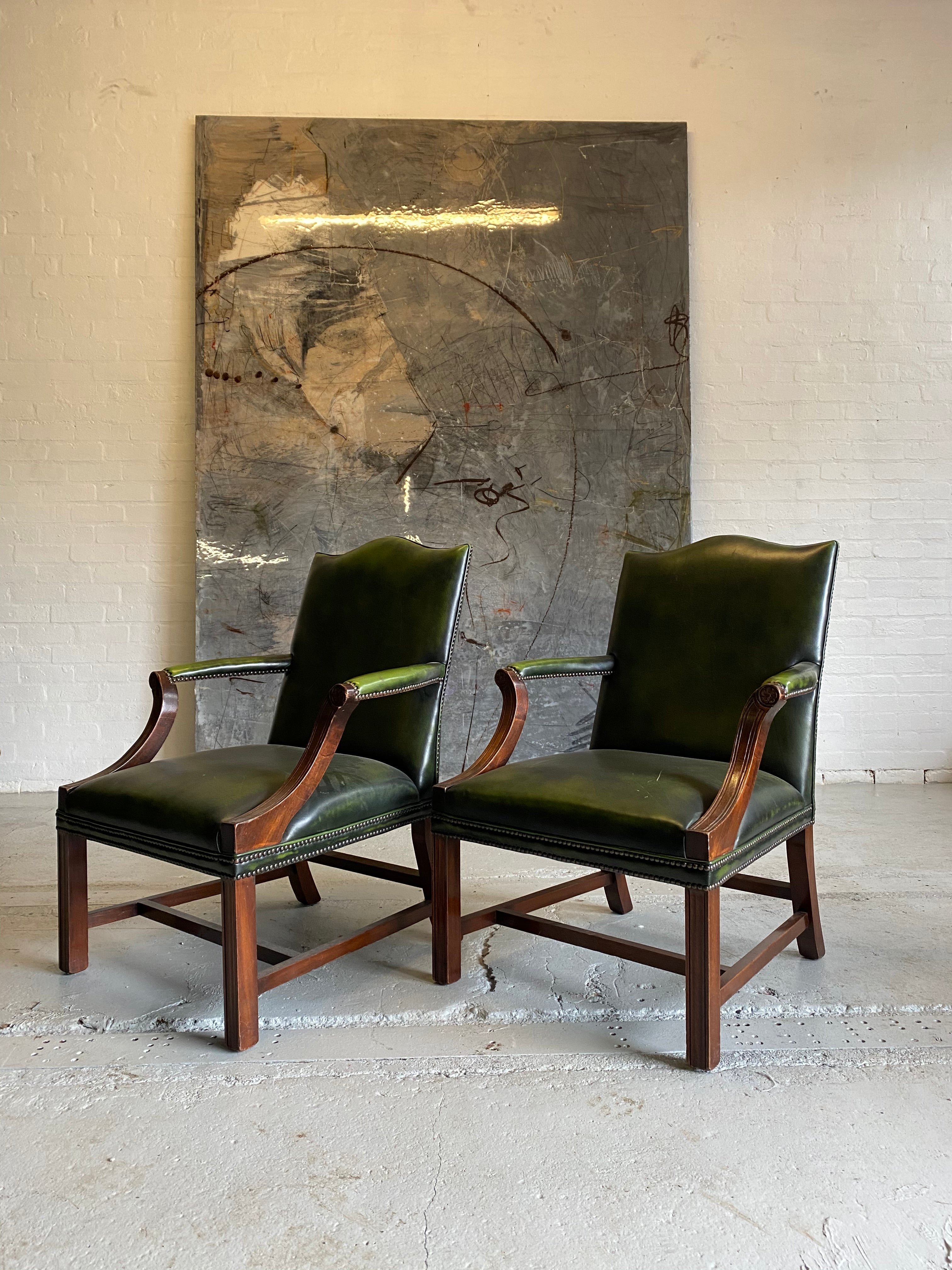 A Beautiful Pair of Library Chairs in Deep Green Leathers