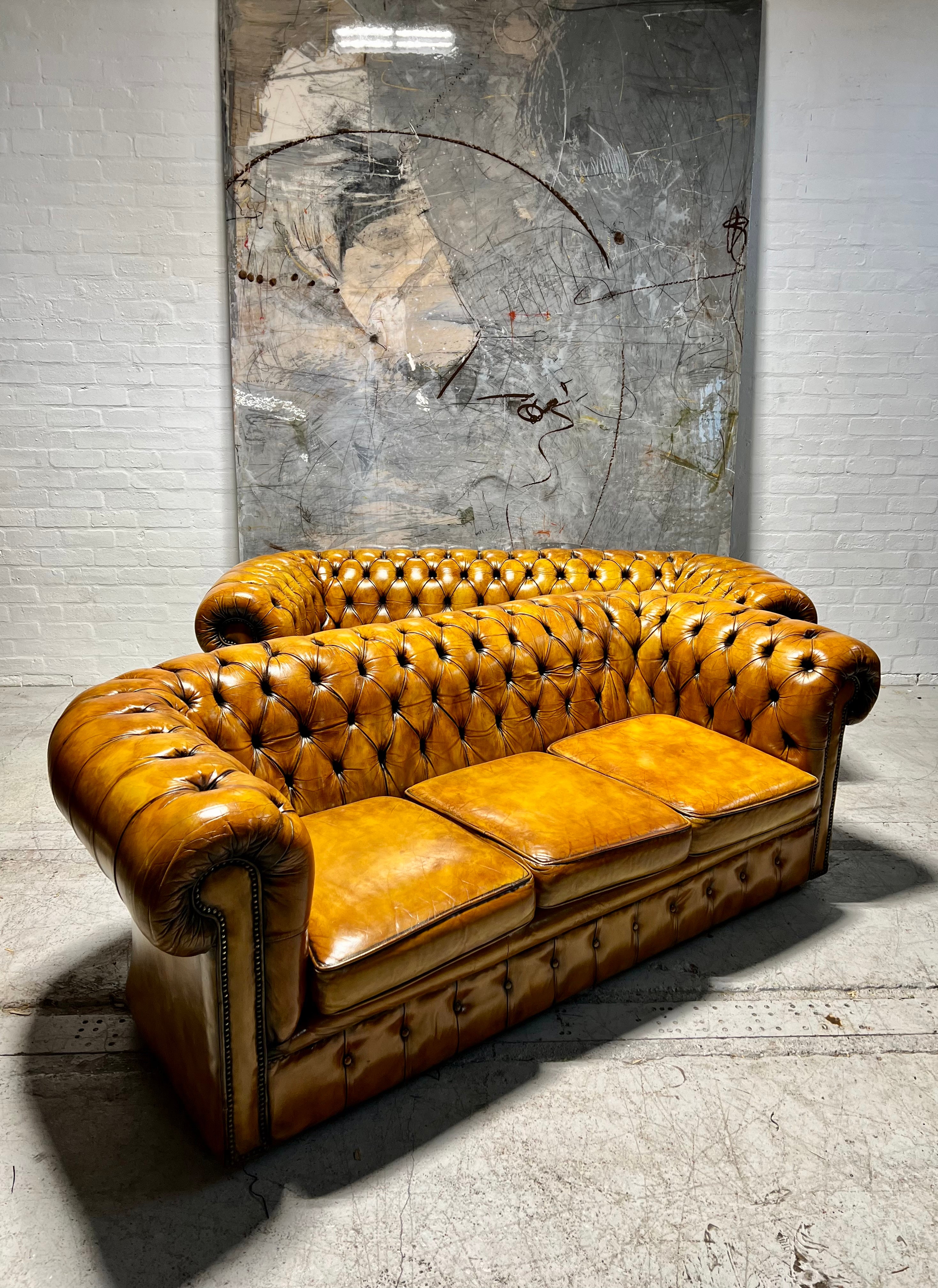 Wow!  A Stunning Matching Pair of Vintage MidC Chesterfield Sofas