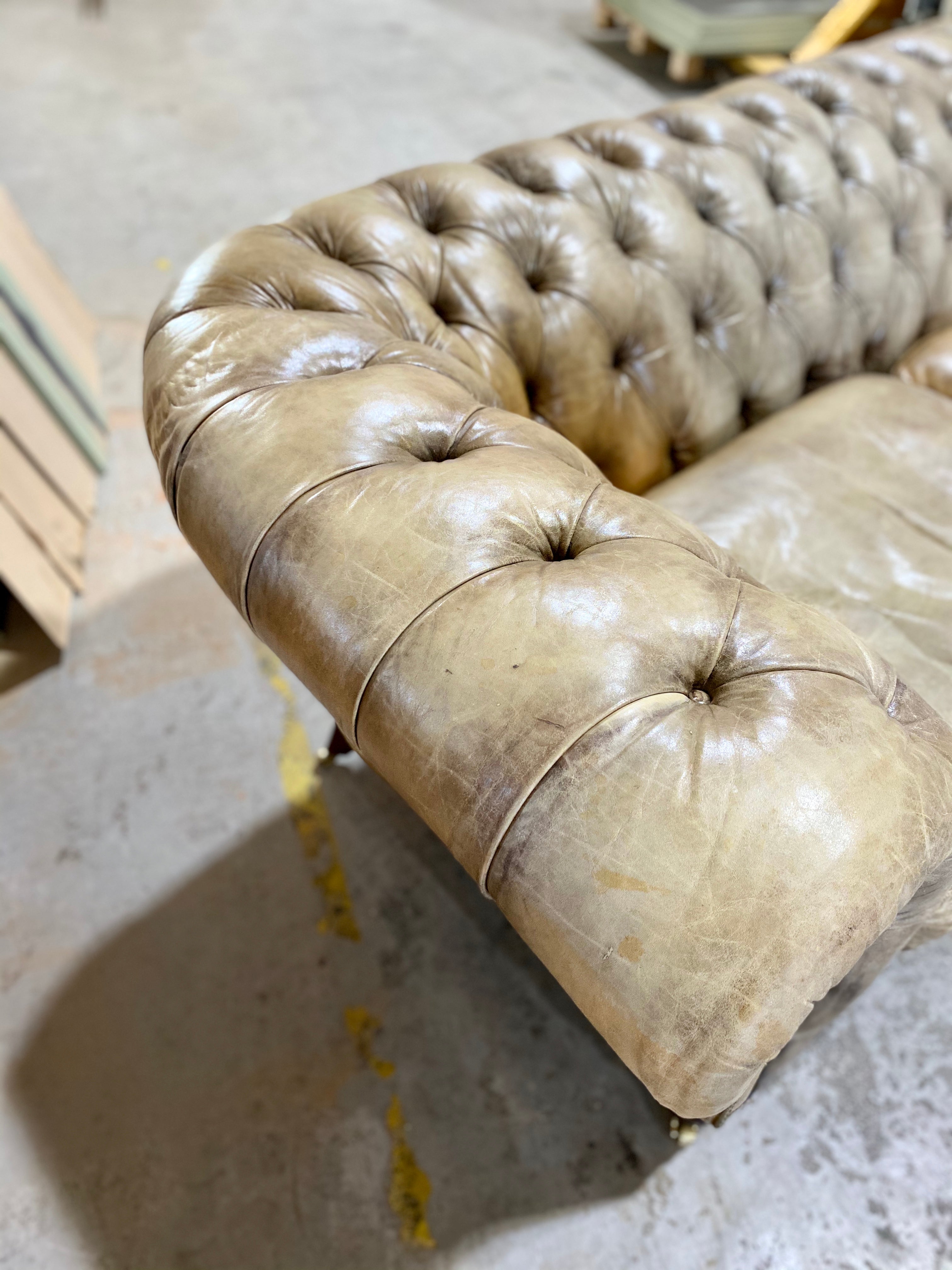 A very Smart 20thC Chesterfield Sofa in very Well Patinated Hand Dyed Leathers