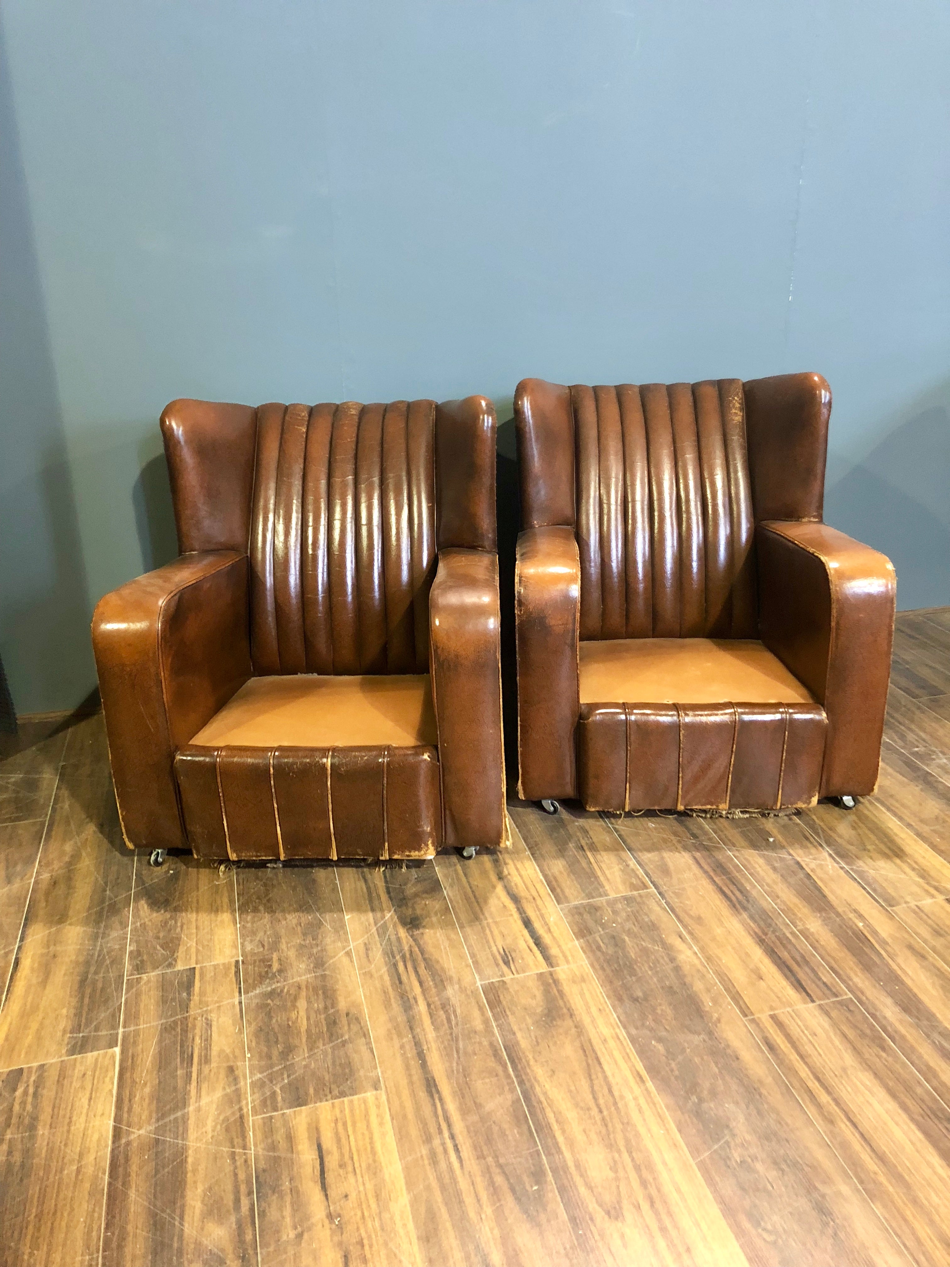 A Very Very Nice Matching Pair of Early 20thC Leather Armchairs