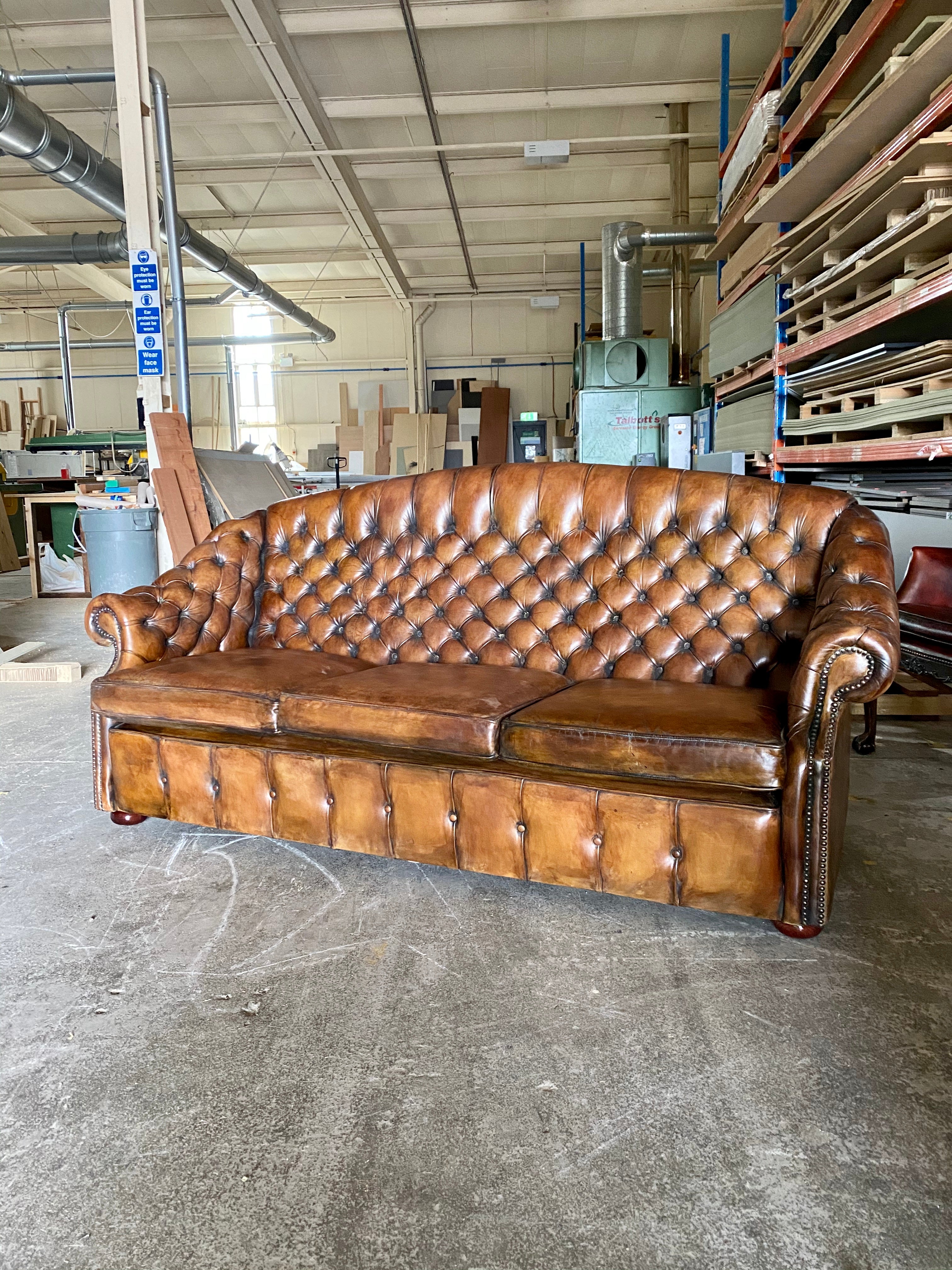 A Beautiful Arch Backed Chesterfield suite in Hand Dyed Leathers