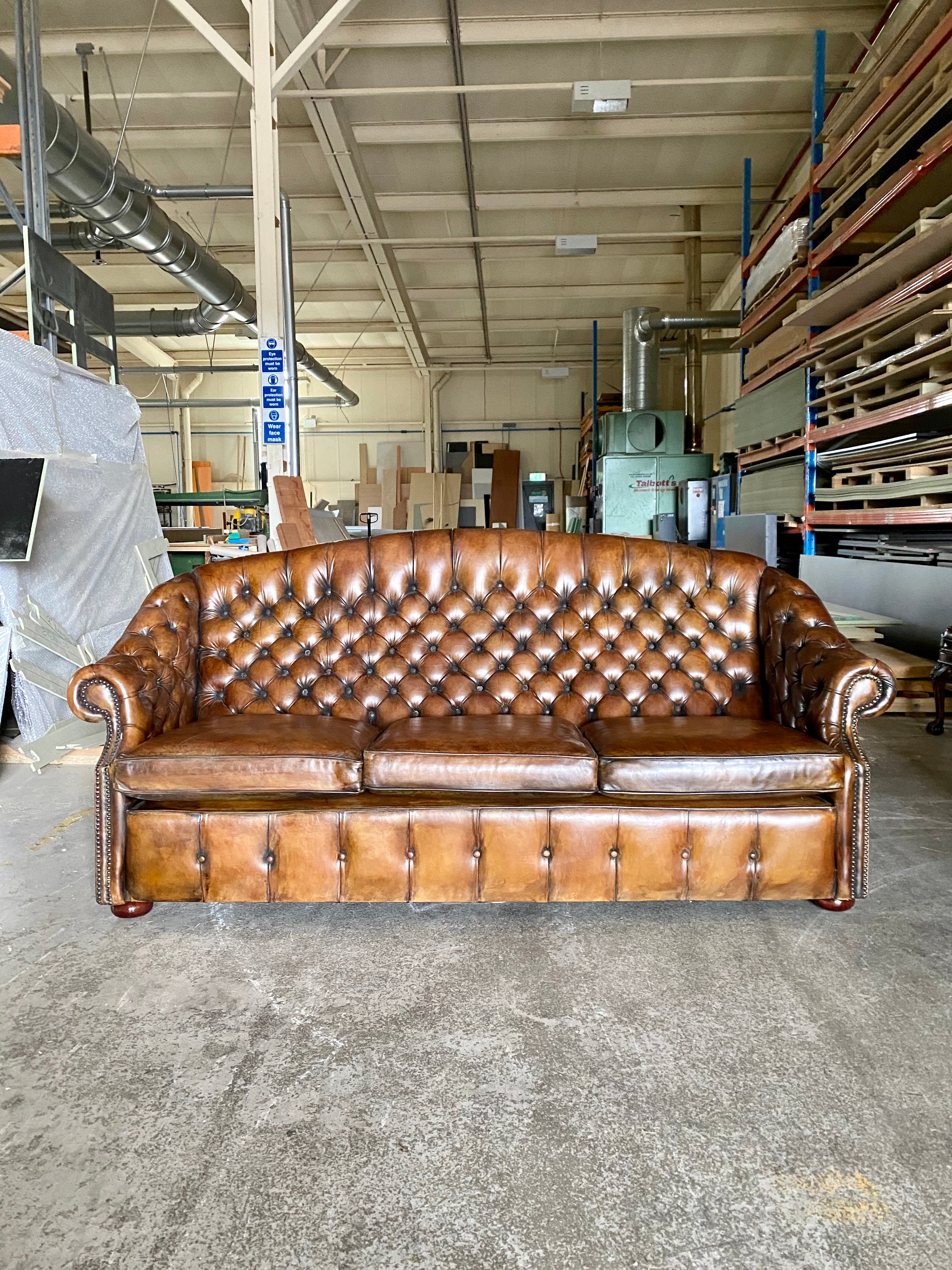 A Beautiful Arch Backed Chesterfield suite in Hand Dyed Leathers