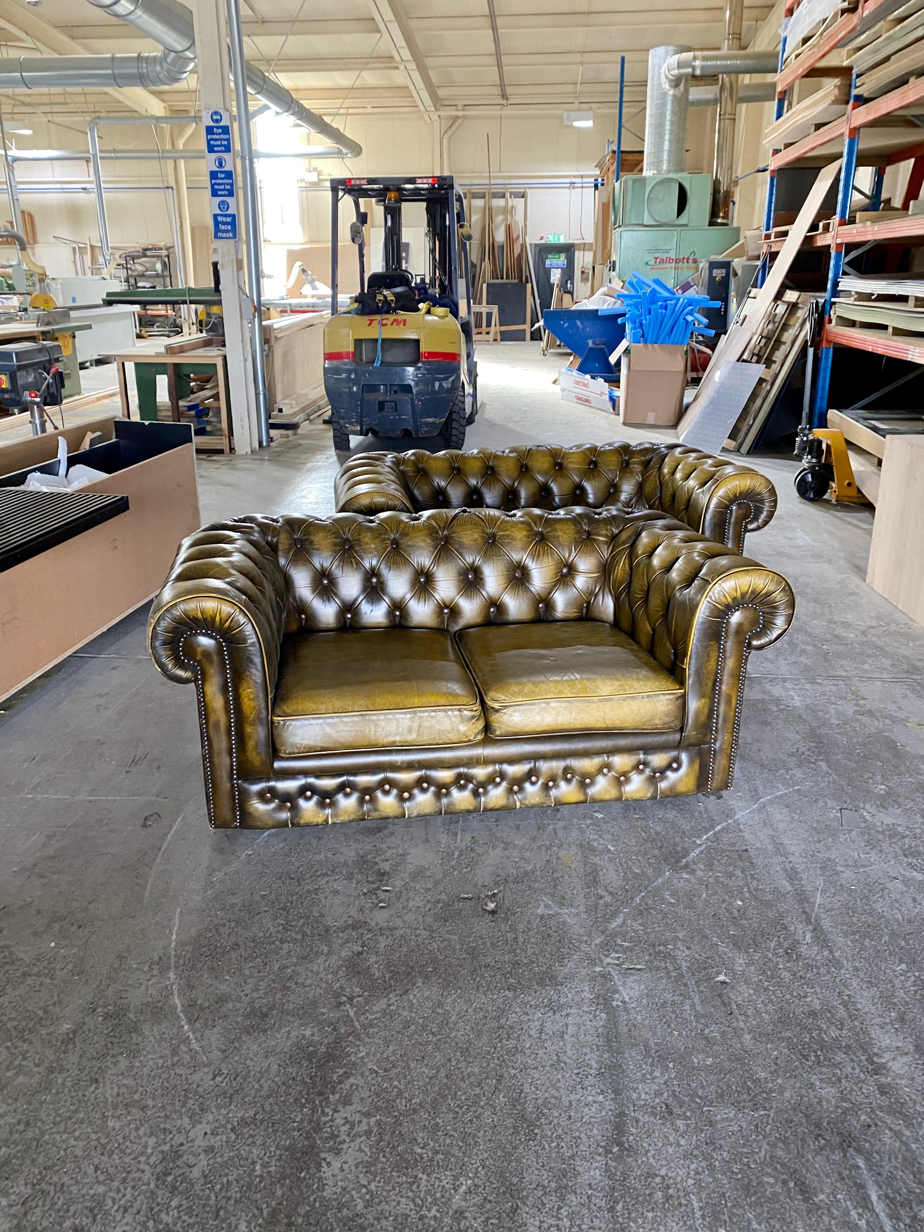 A Very Cool Pair of 2 seat Chesterfield Sofas in Autumn Tans