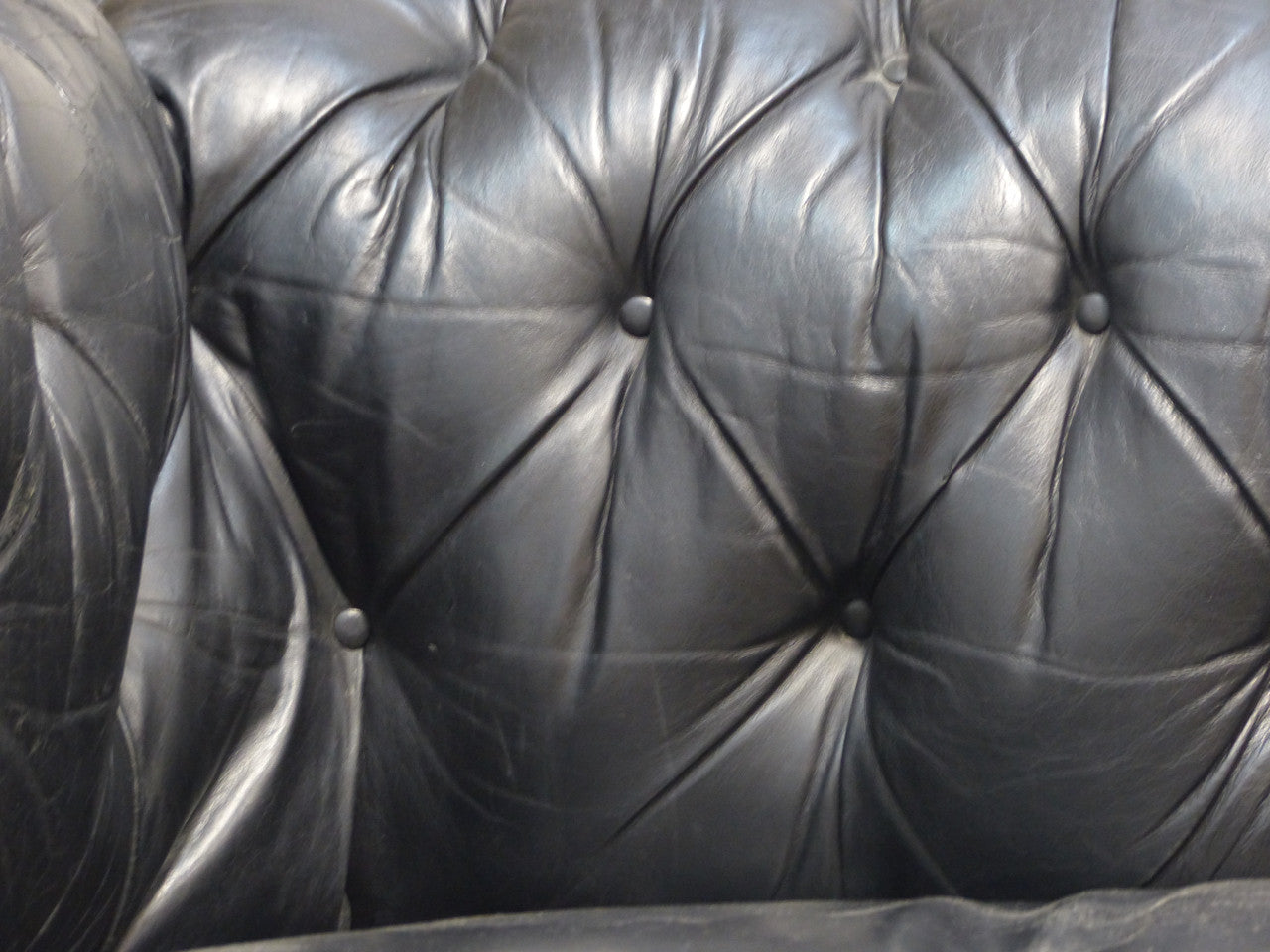 EARLY TWENTIETH CENTURY ANTIQUE CHESTERFIELD IN BLACK