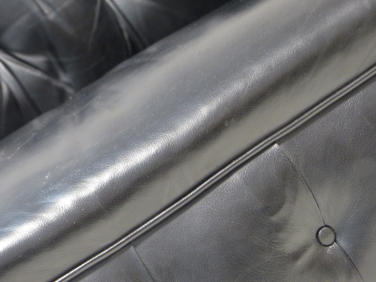 EARLY TWENTIETH CENTURY ANTIQUE CHESTERFIELD IN BLACK