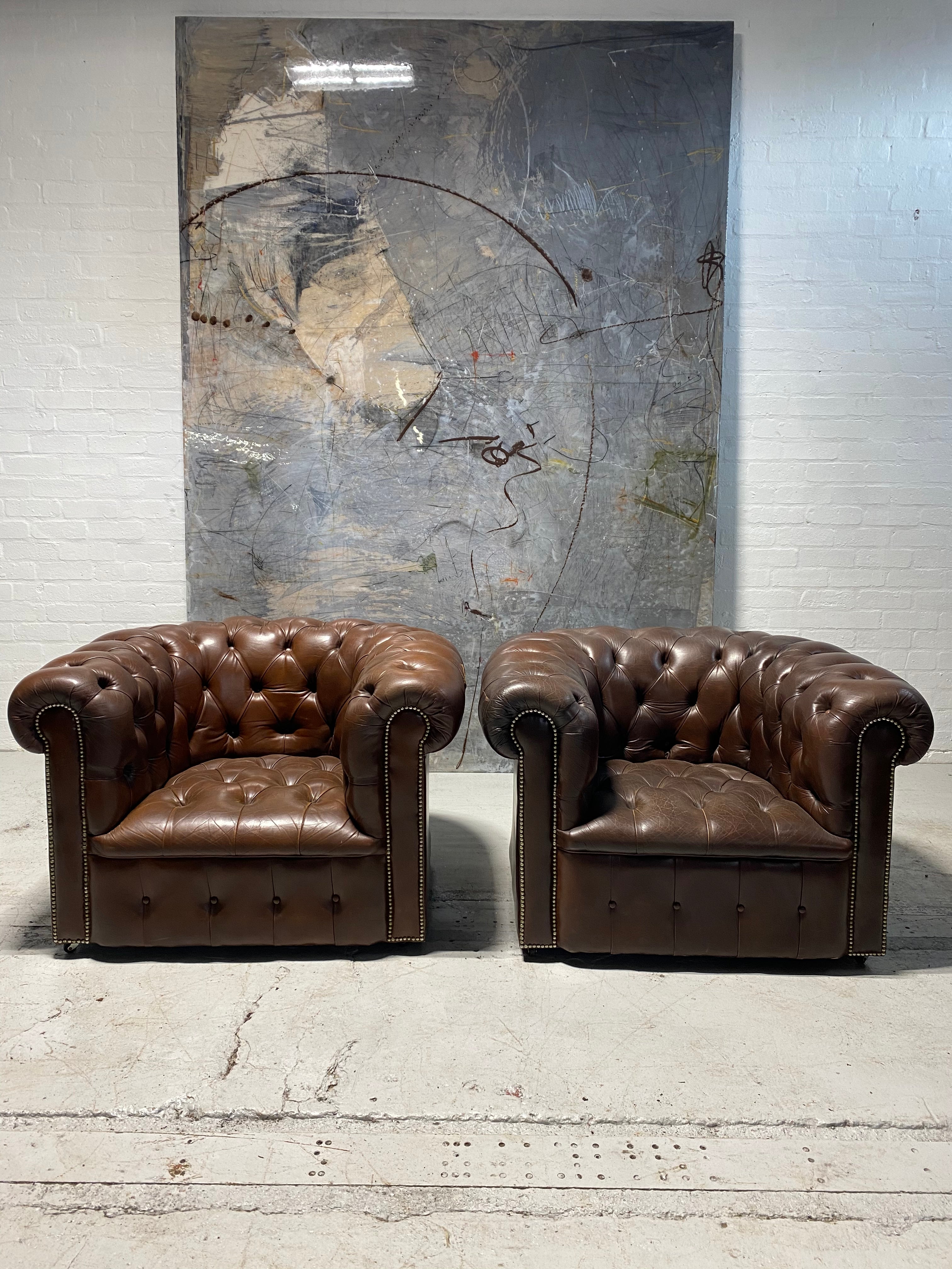 A Super Pair of Chesterfield Club Chairs in Brown