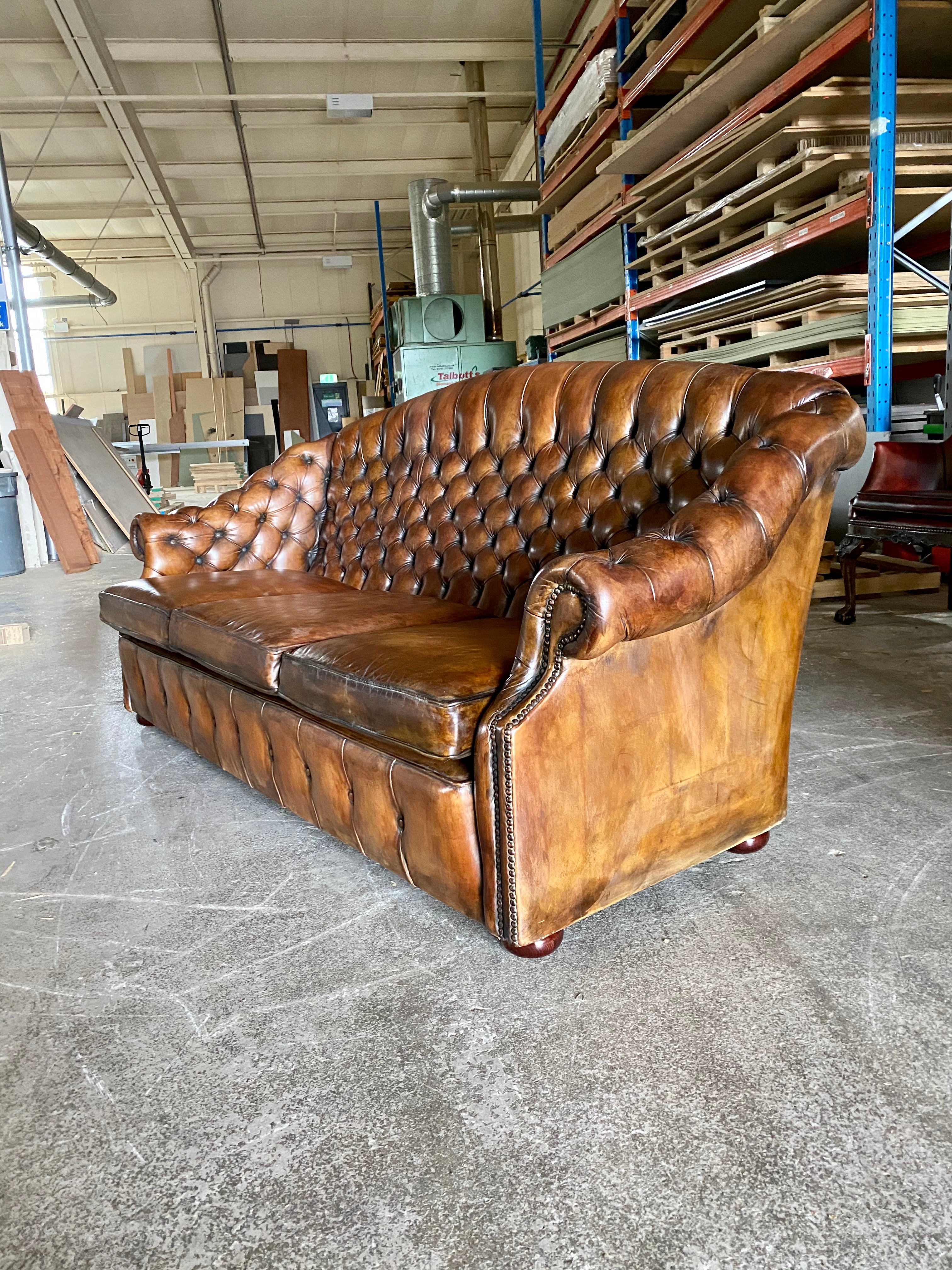 A Beautiful Arch Backed Chesterfield suite in Hand Dyed Leathers