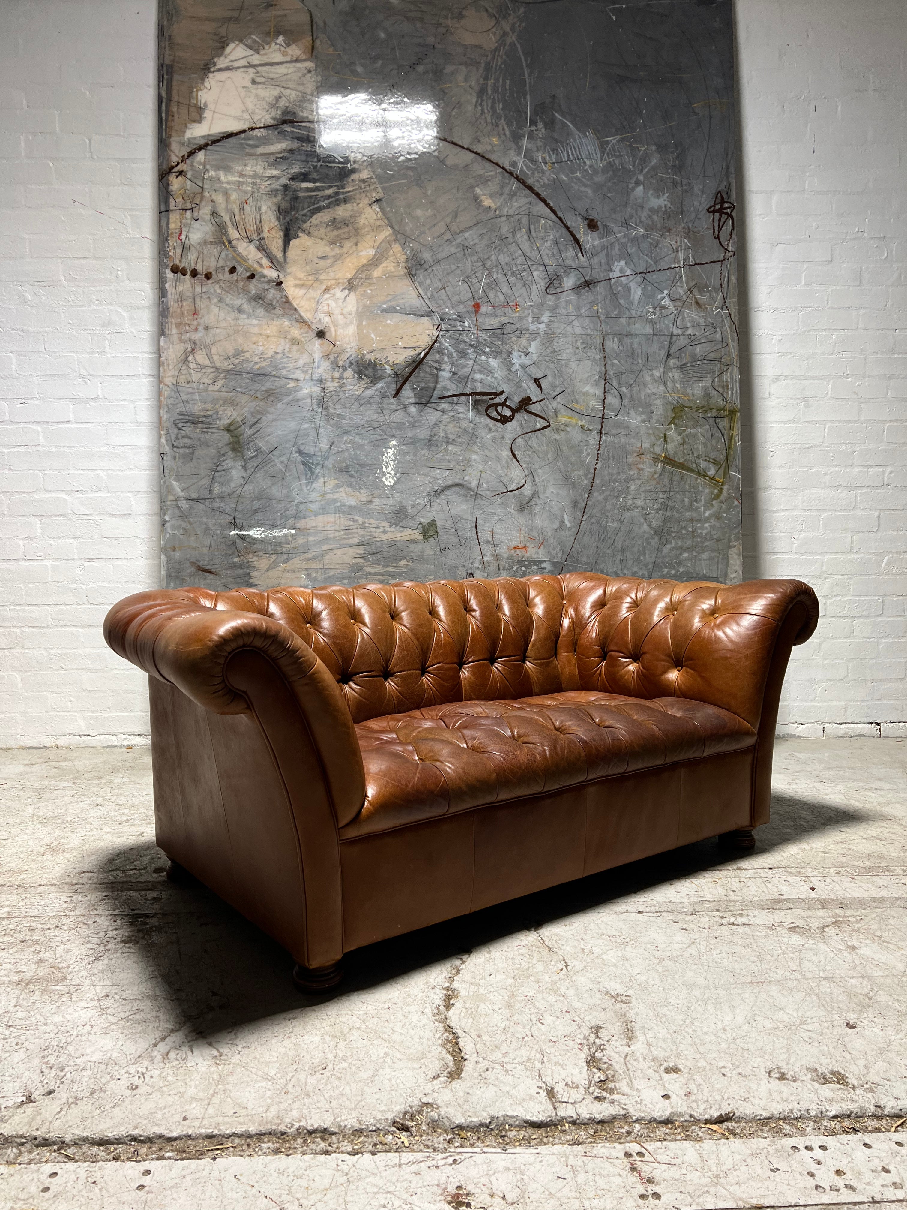 A Smart Rustic Tan 2 Seat Chesterfield Sofa