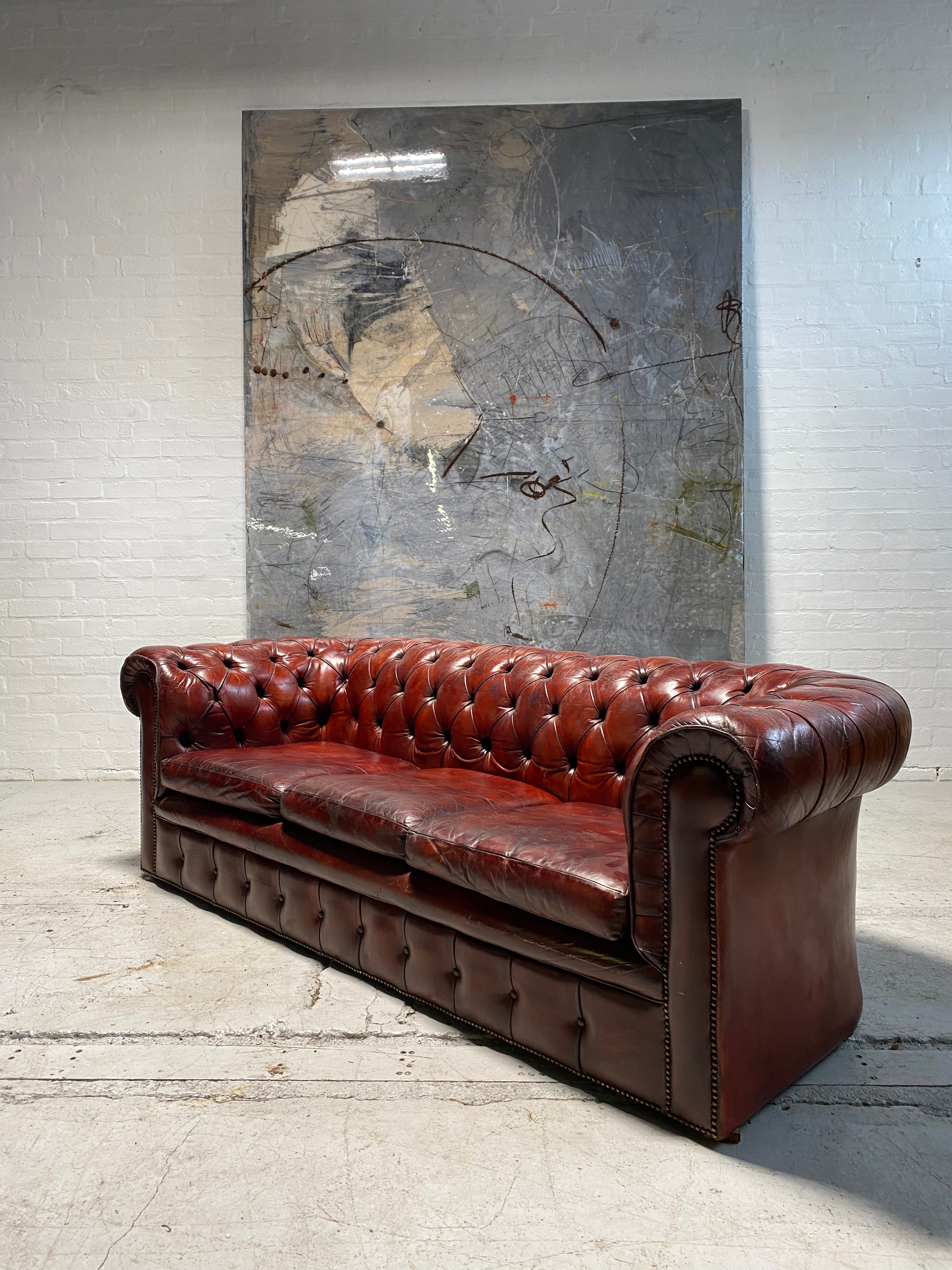 A Stunning MidC Vintage Chesterfield Sofa