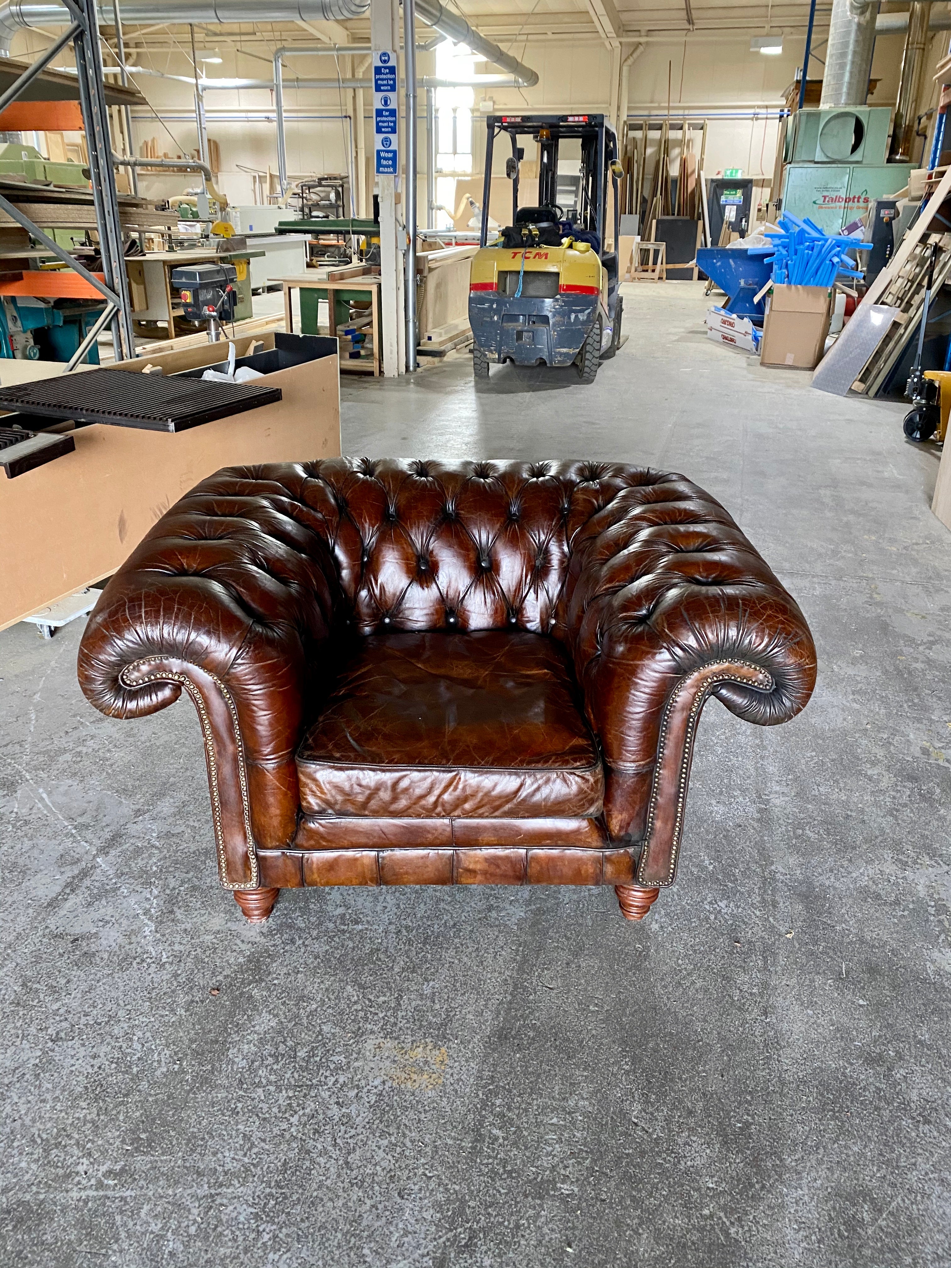 An Exceptionally Large Gentleman’s Club Chair in Hand Dyed Dark Walnut