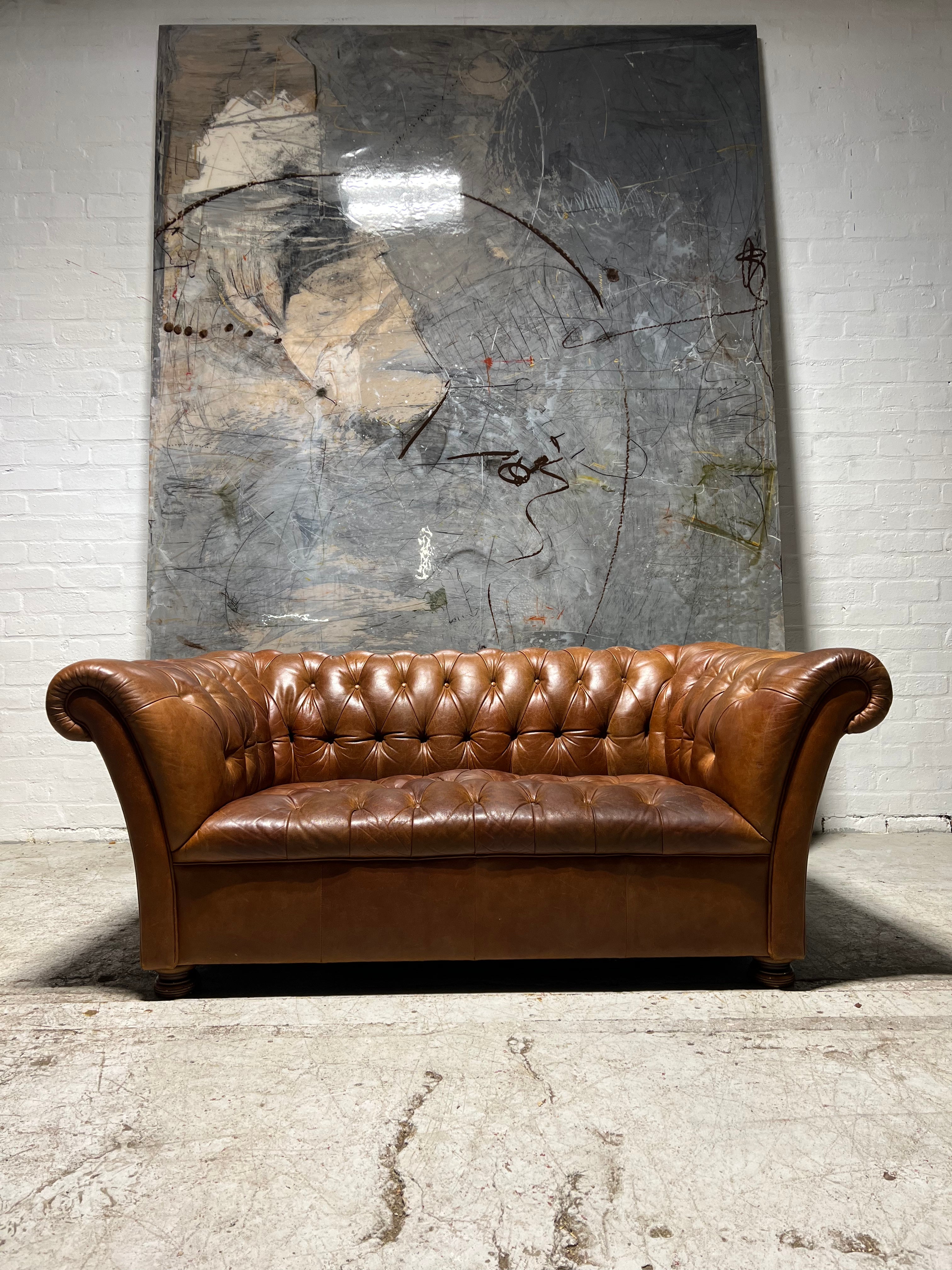 A Smart Rustic Tan 2 Seat Chesterfield Sofa