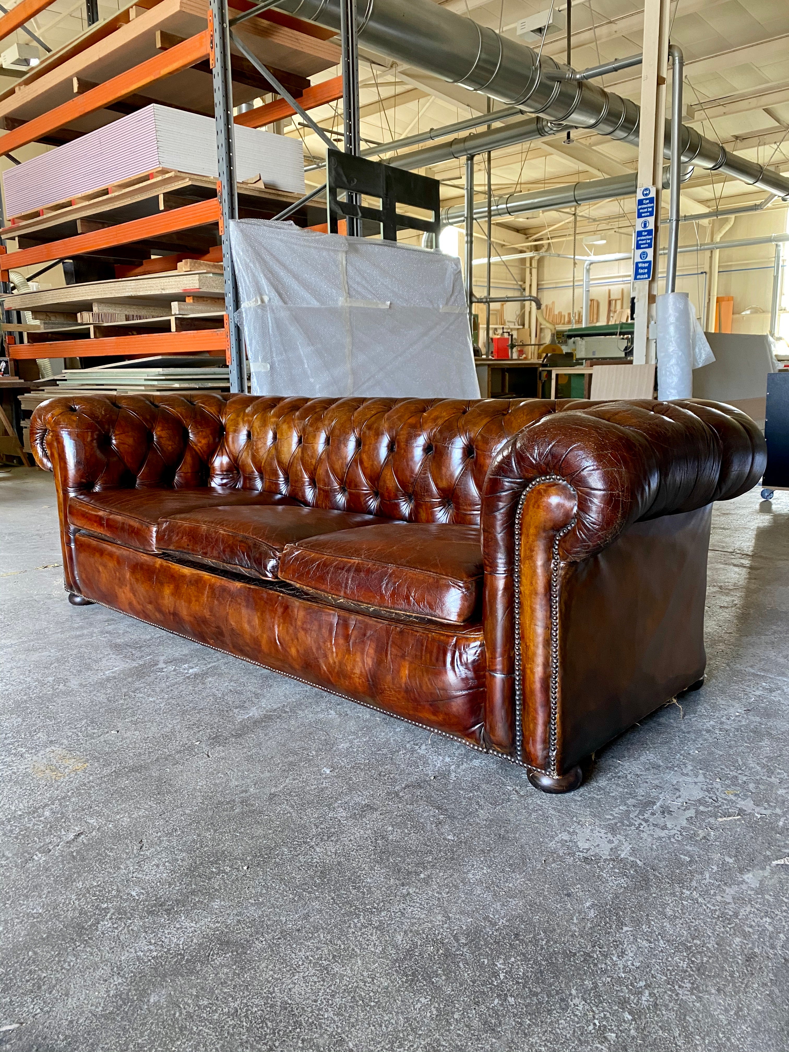 A Very Smart MidC Hand Dyed Leather Chesterfield Sofa in Conker