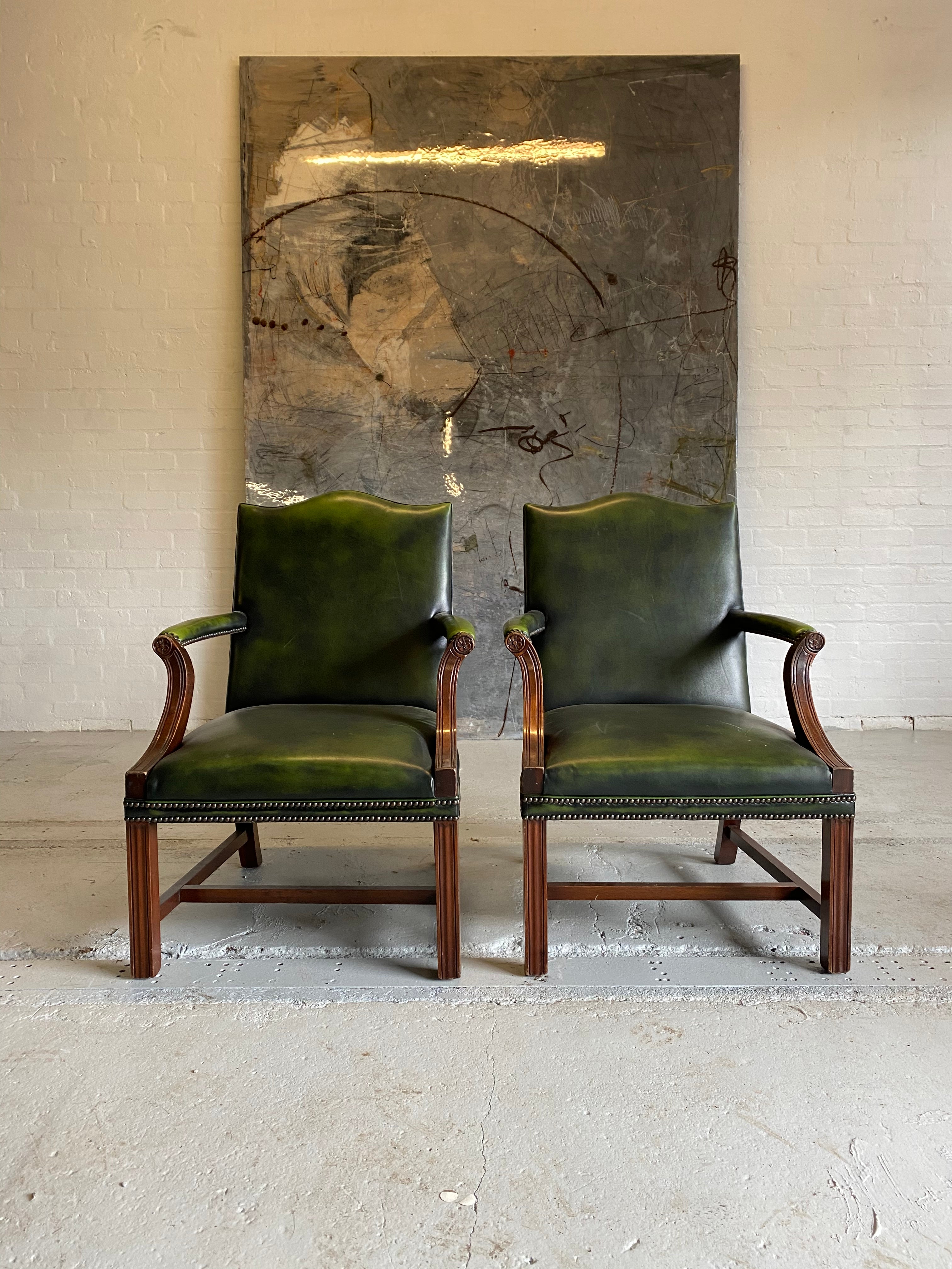 A Beautiful Pair of Library Chairs in Deep Green Leathers