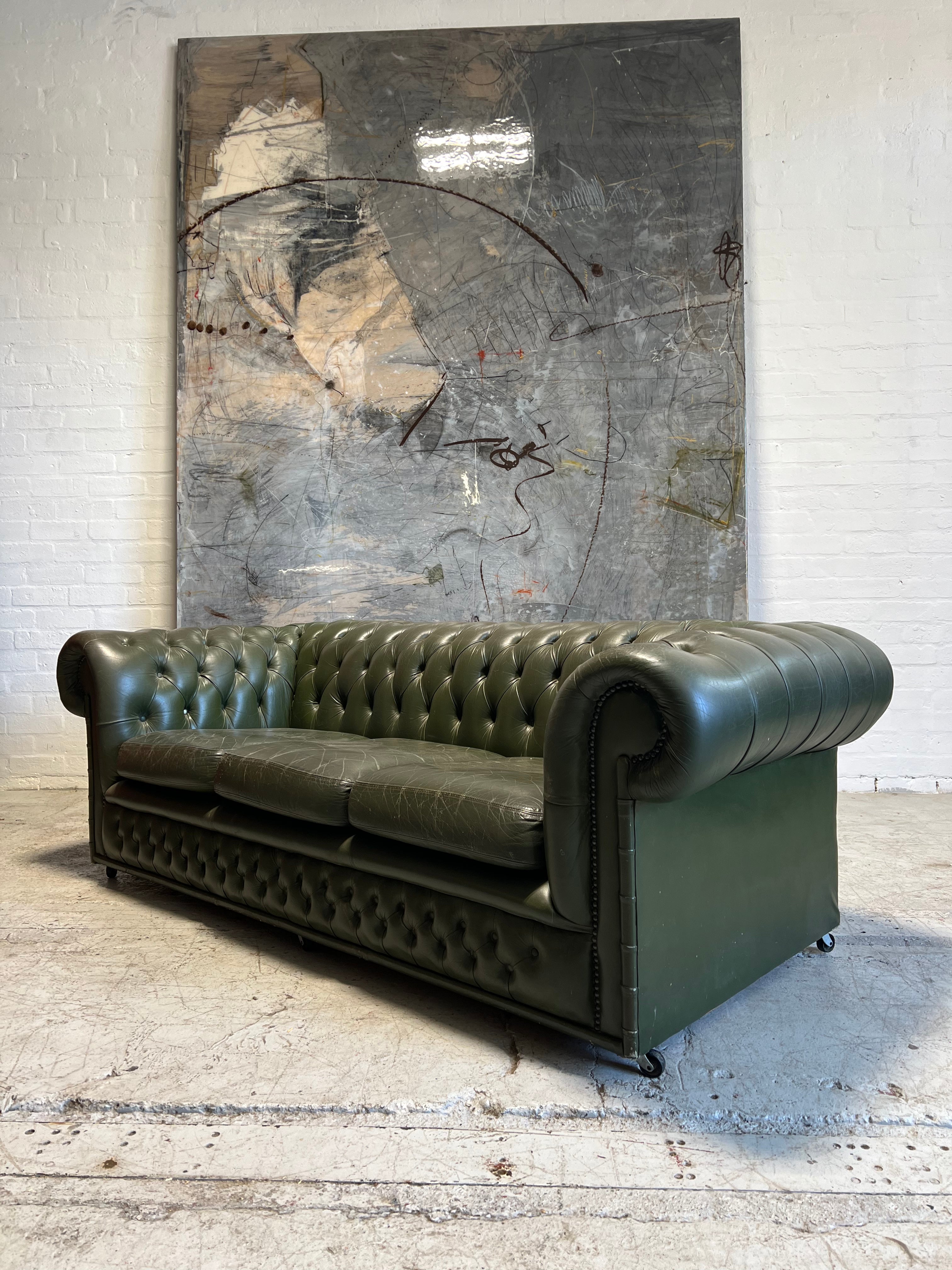 One of a Pair - a Very Smart Military Green Leather Chesterfield Sofa