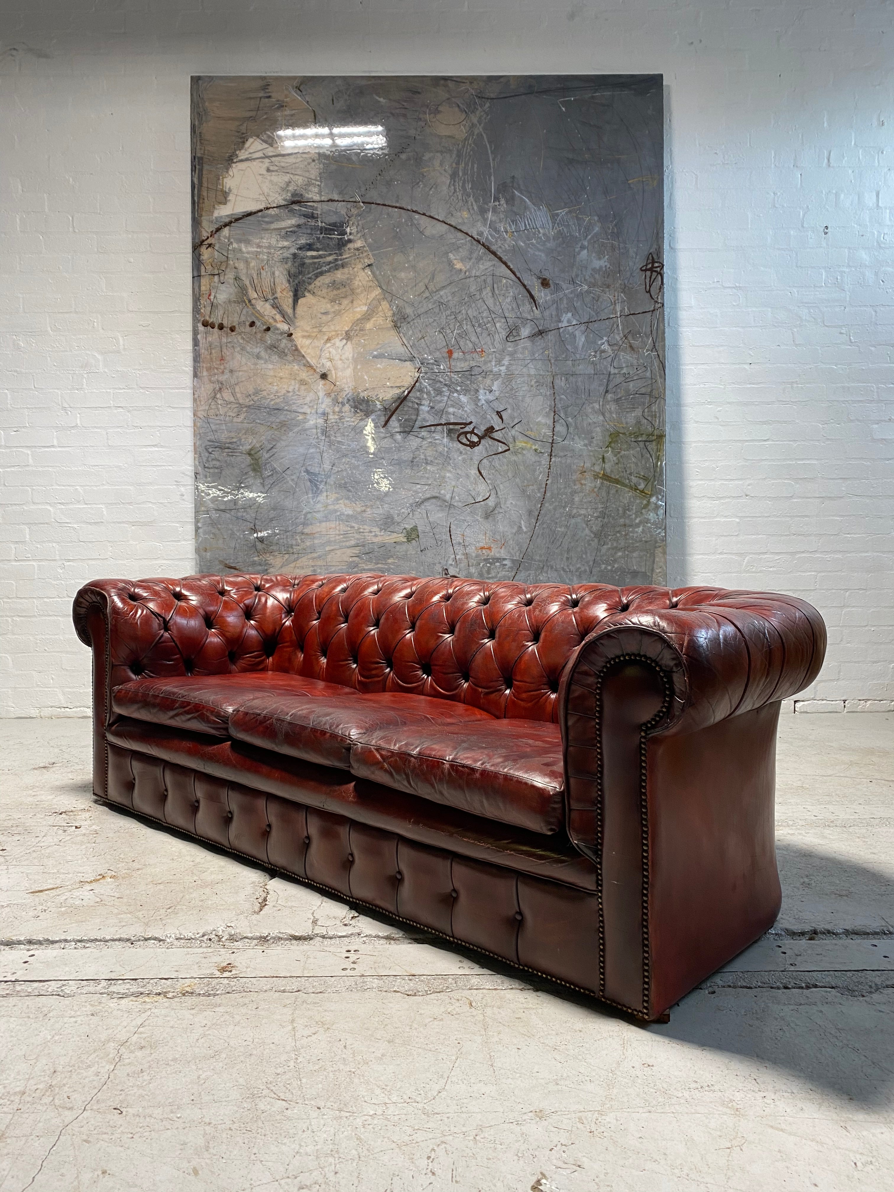 A Stunning MidC Vintage Chesterfield Sofa