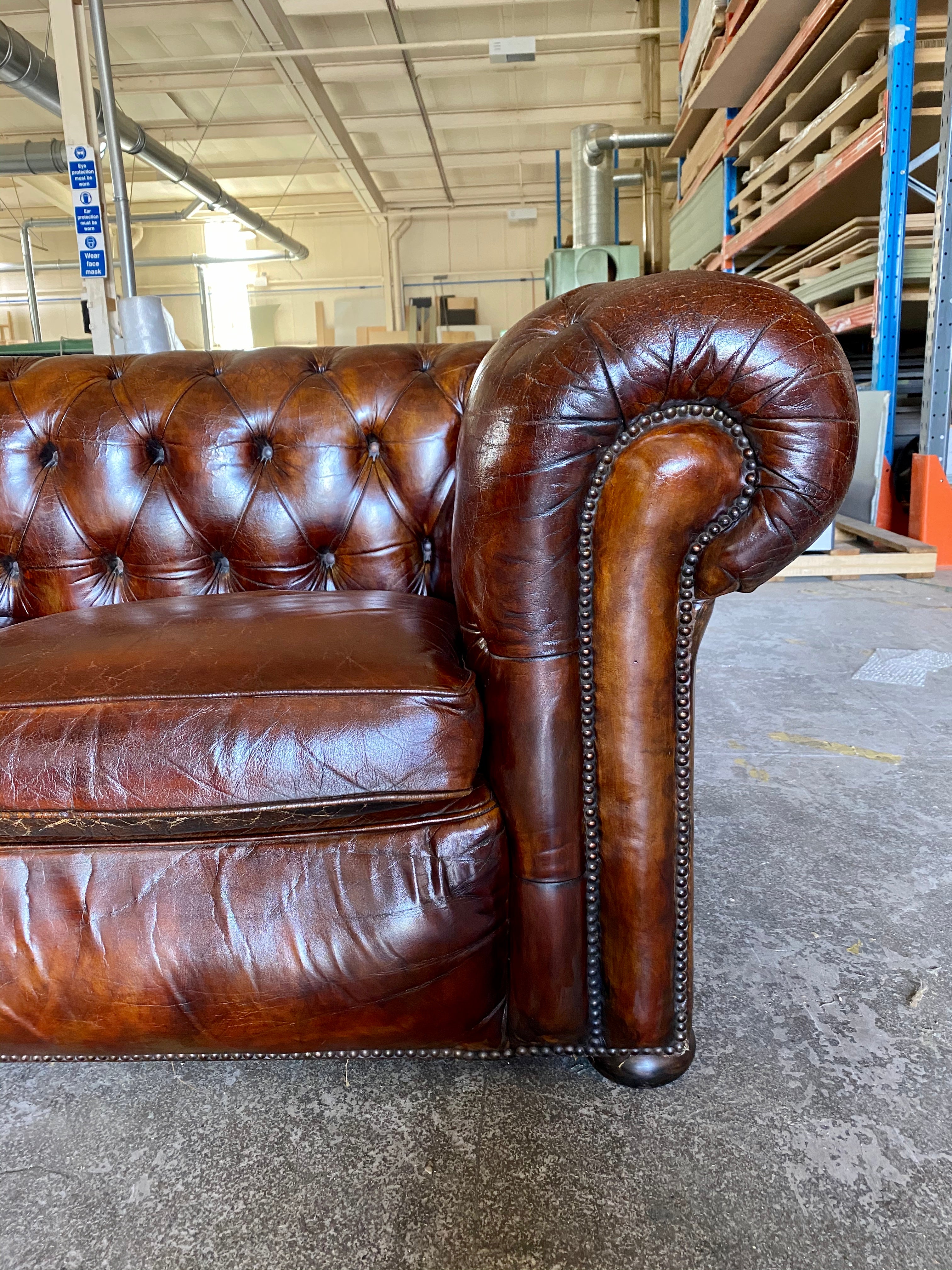 A Very Smart MidC Hand Dyed Leather Chesterfield Sofa in Conker