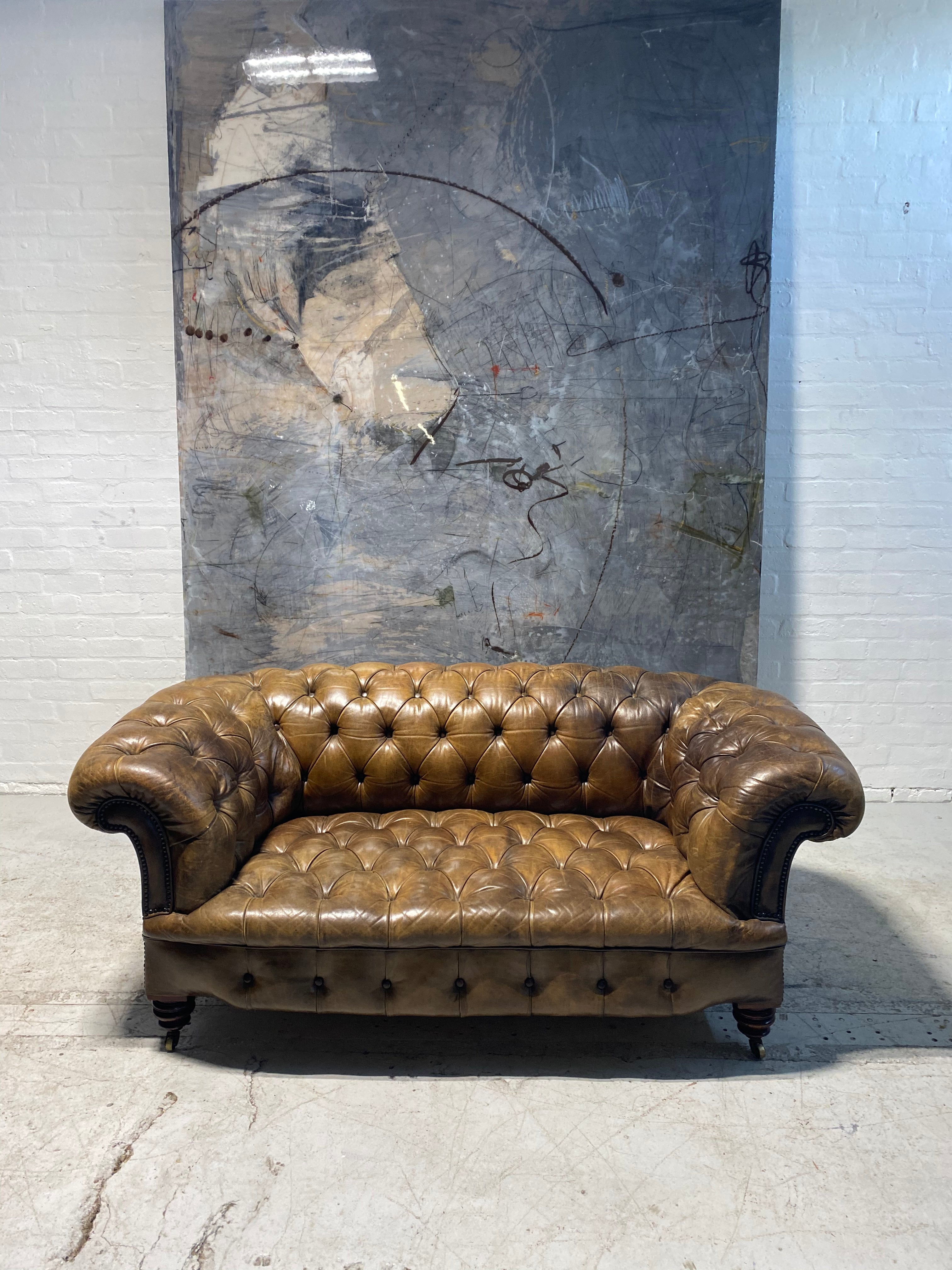 A Very Special and Rare Howard & Sons 19thC Chesterfield Sofa in Original Leathers