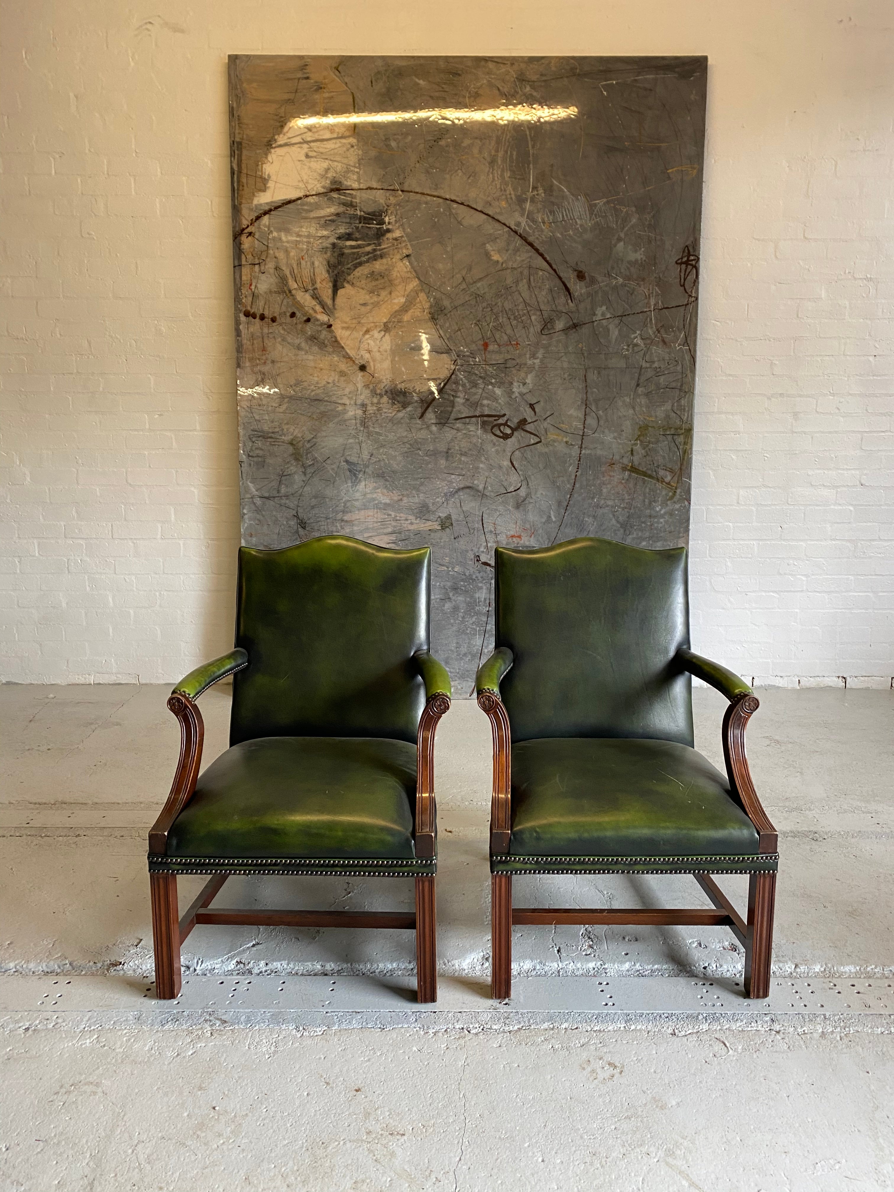 A Beautiful Pair of Library Chairs in Deep Green Leathers