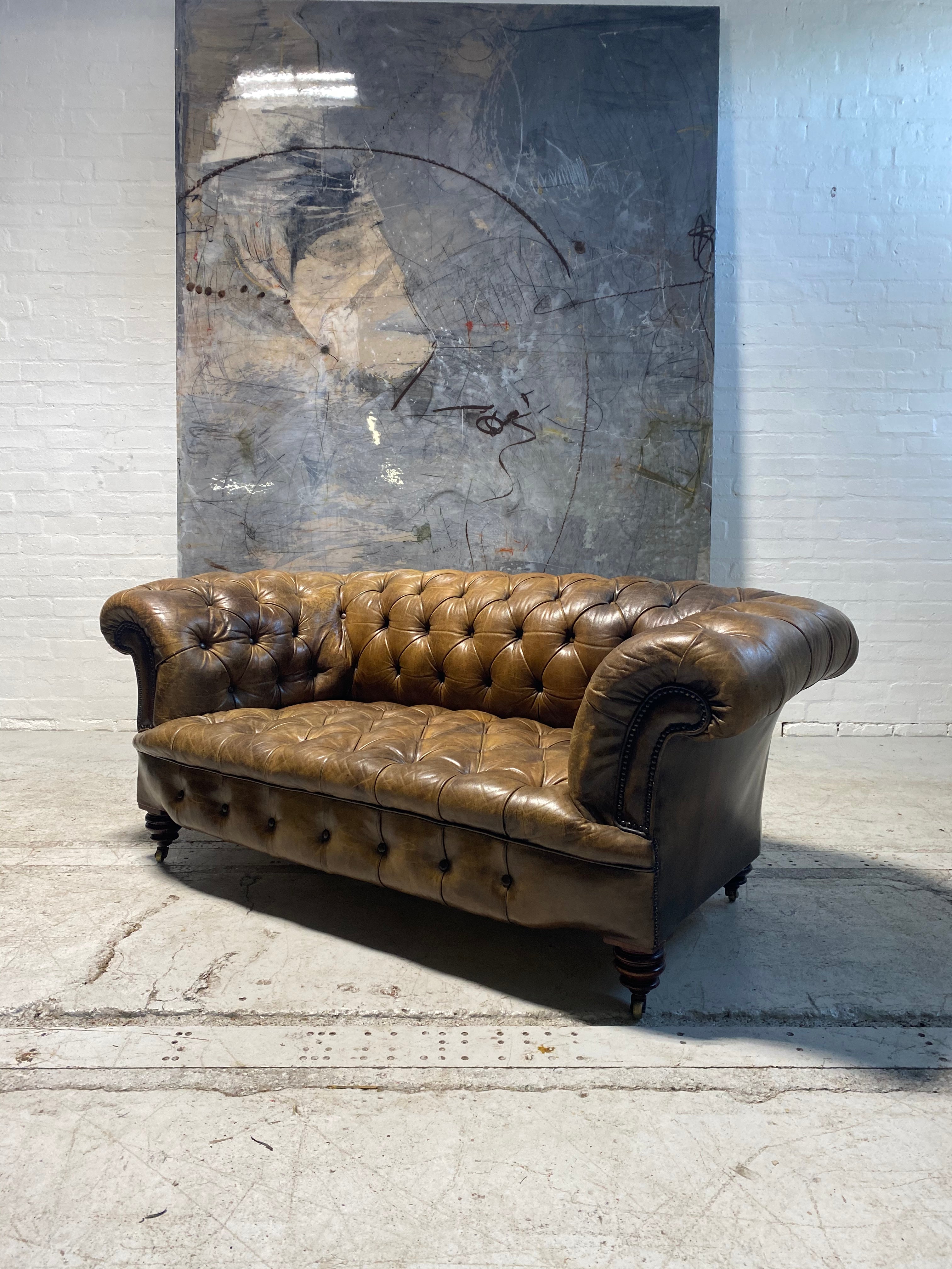 A Very Special and Rare Howard & Sons 19thC Chesterfield Sofa in Original Leathers