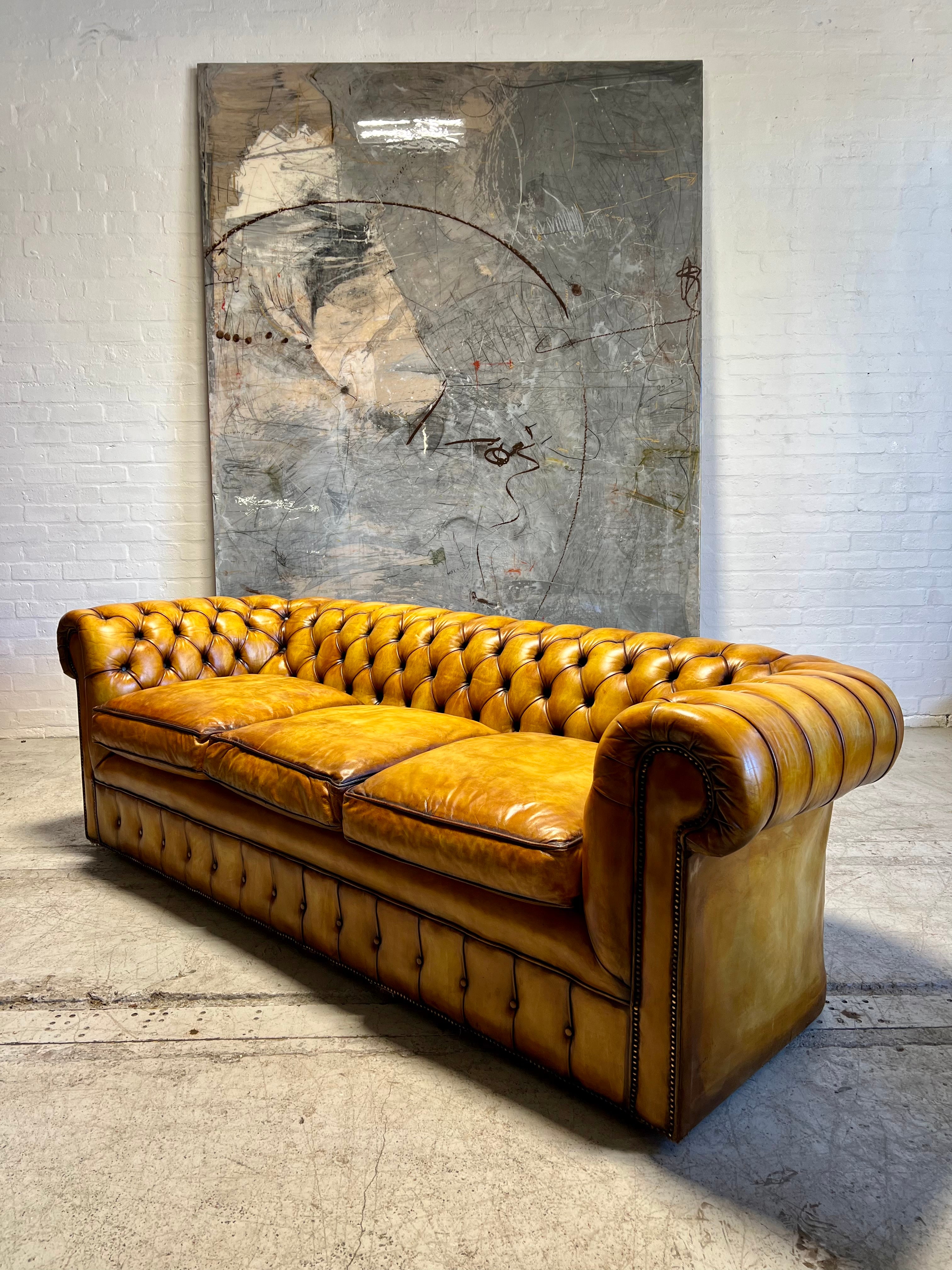 An Exceptional Autumn Gold Hand Dyed Leather Chesterfield Sofa 240cm