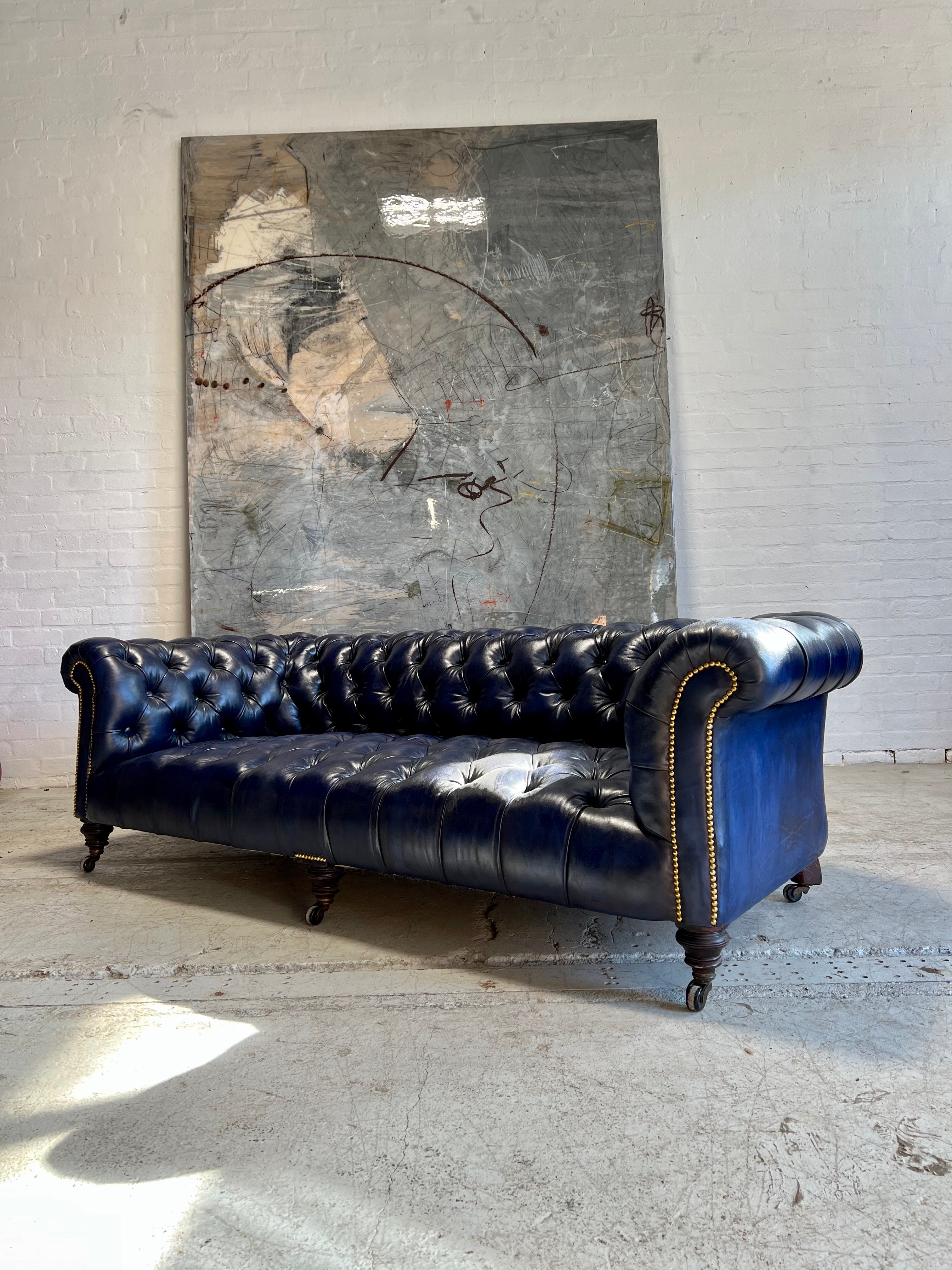 A Very Good 4 Seat Antique Victorian 19thC Chesterfield Sofa - Fully a restored in Hand Dyed Deep Ocean Navy Blue Leather