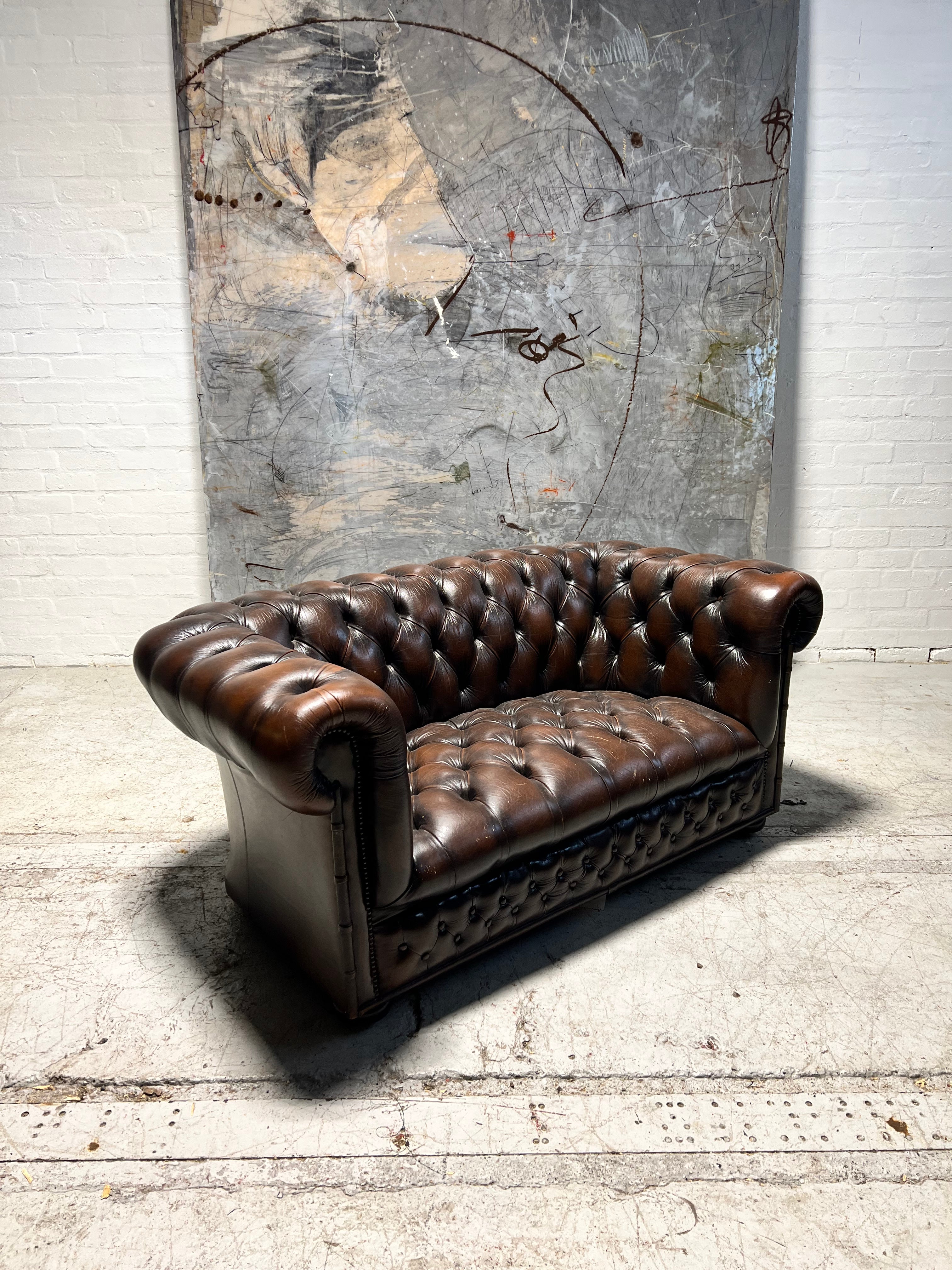 A Lovely Little Brown Leather Chesterfield 2 Seat Sofa