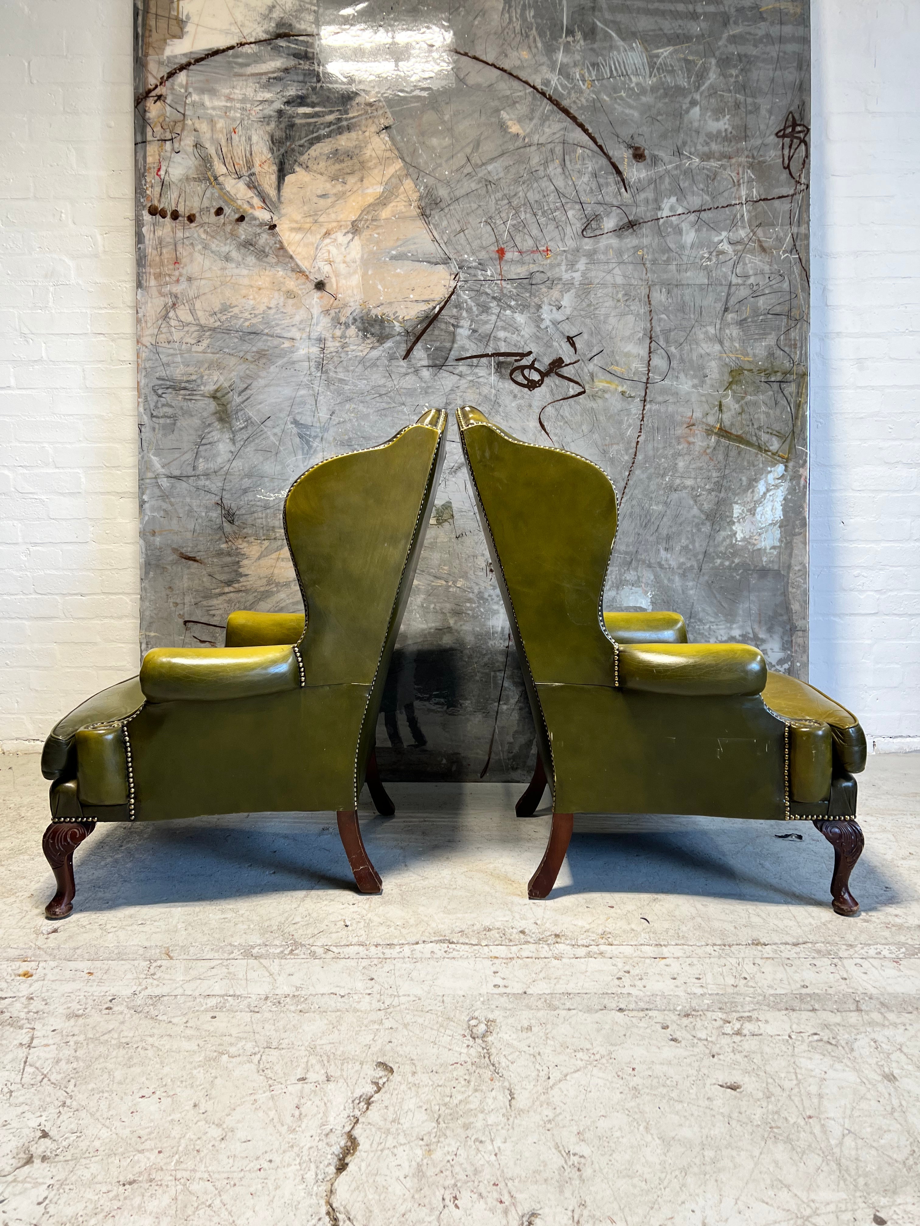 Stunning Pair of MidC Chesterfield Wing Back Chairs in Striking Olive Green