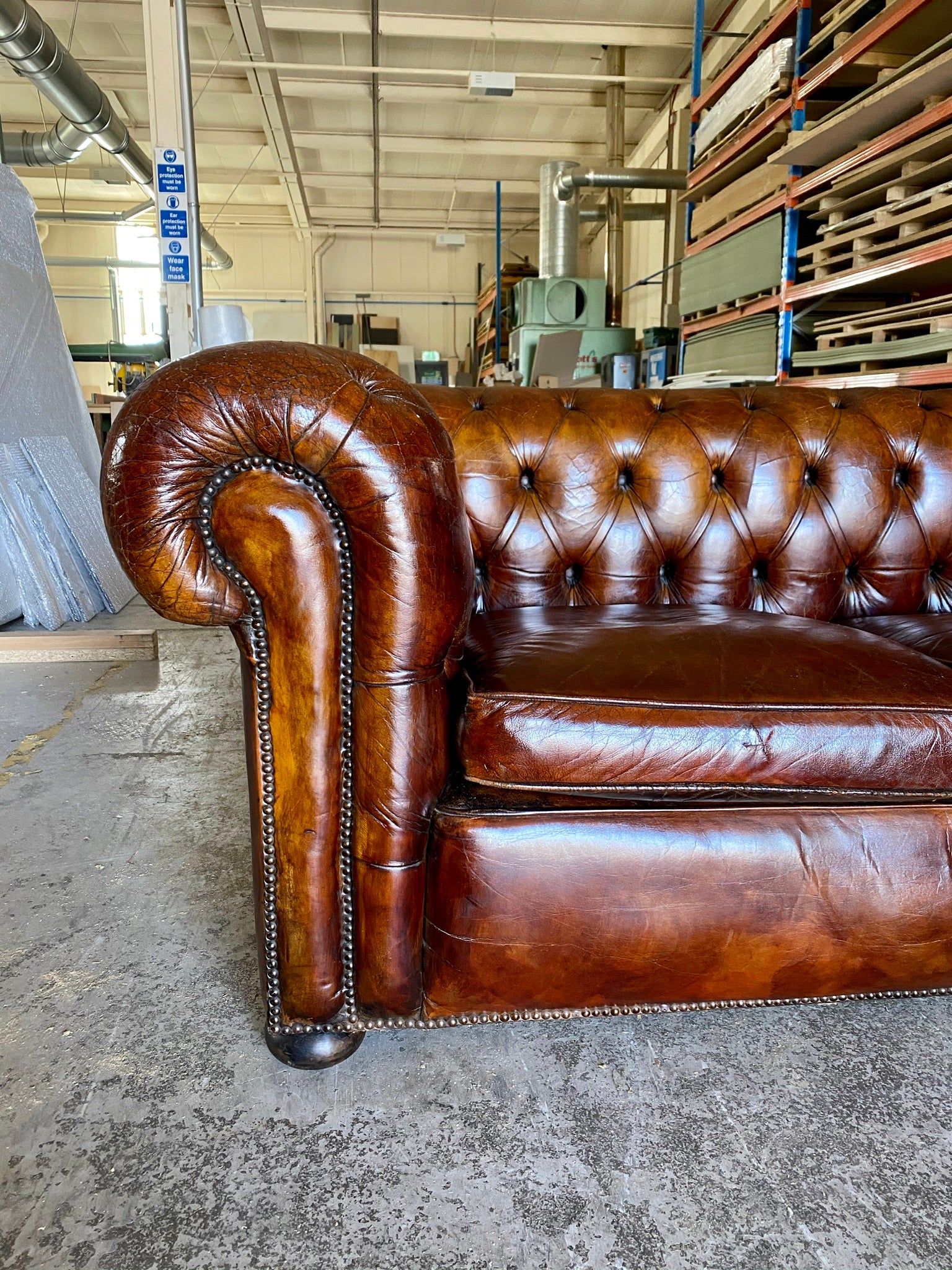 A Very Smart MidC Hand Dyed Leather Chesterfield Sofa in Conker