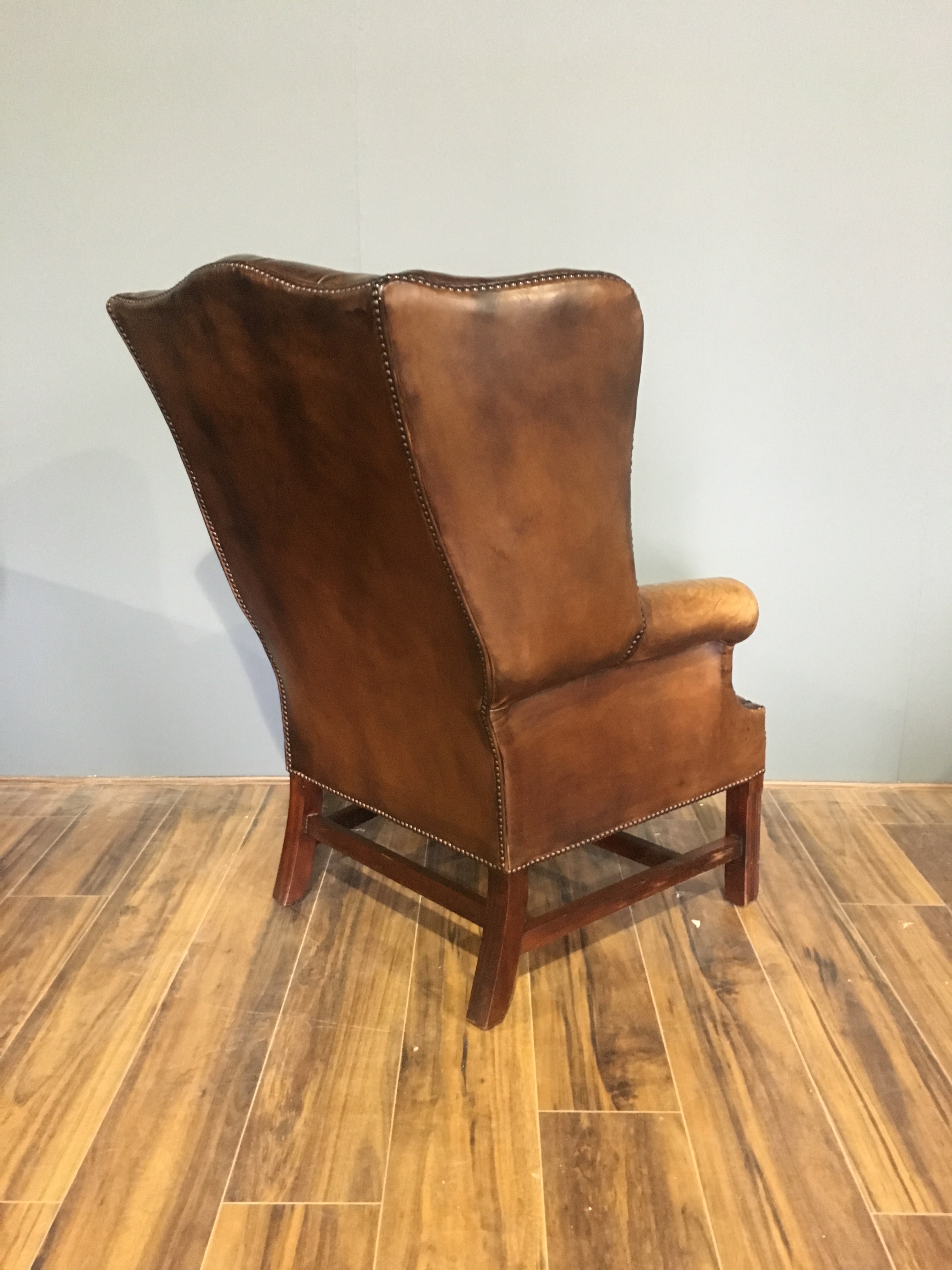 An Exceptional Vintage Leather Chesterfield Wing Chair