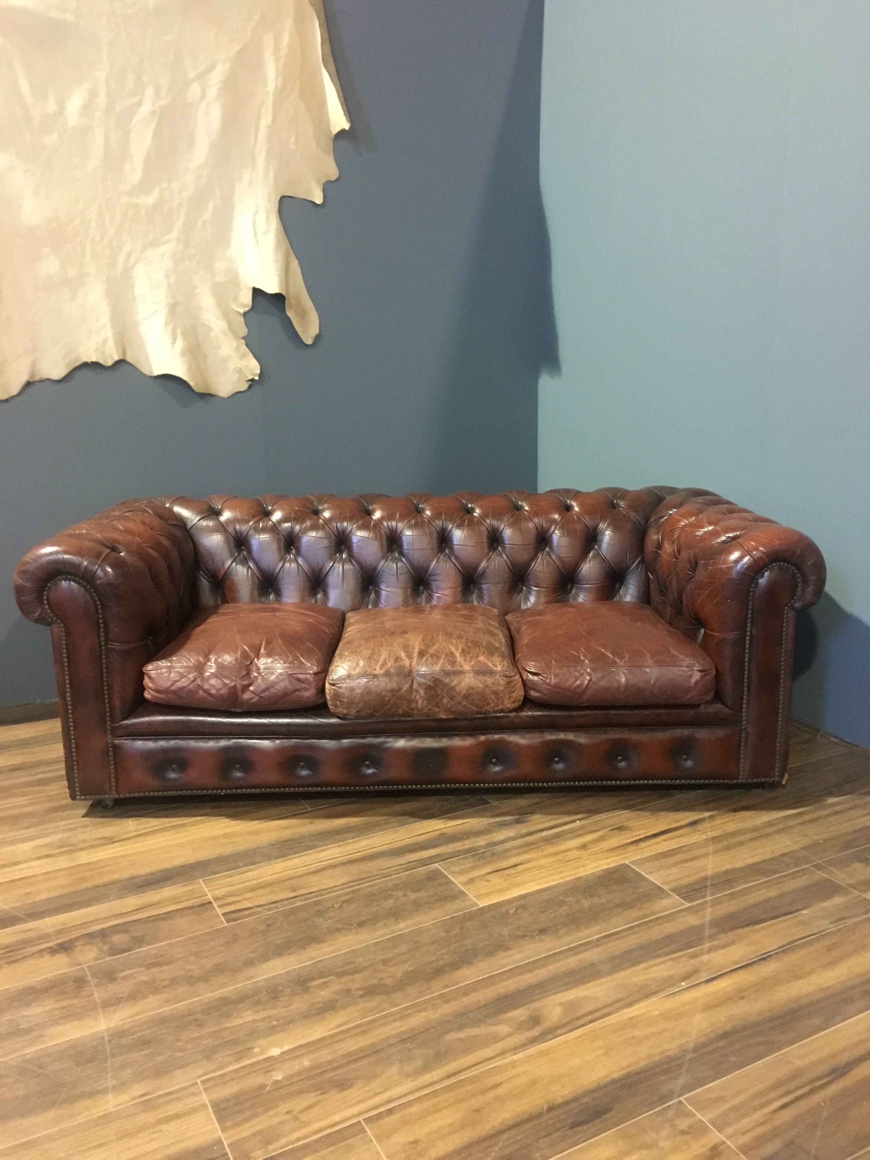 A Rustic Burnt Red Sofa with Great Character