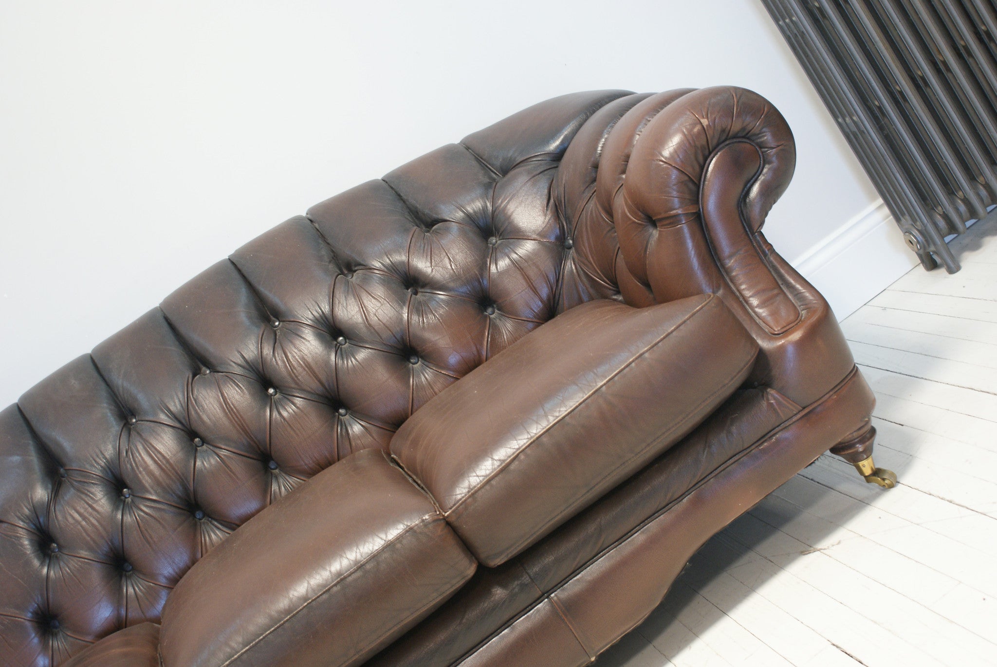 A VERY NICE PRELOVED CHESTERFIELD WITH HIGH BACK