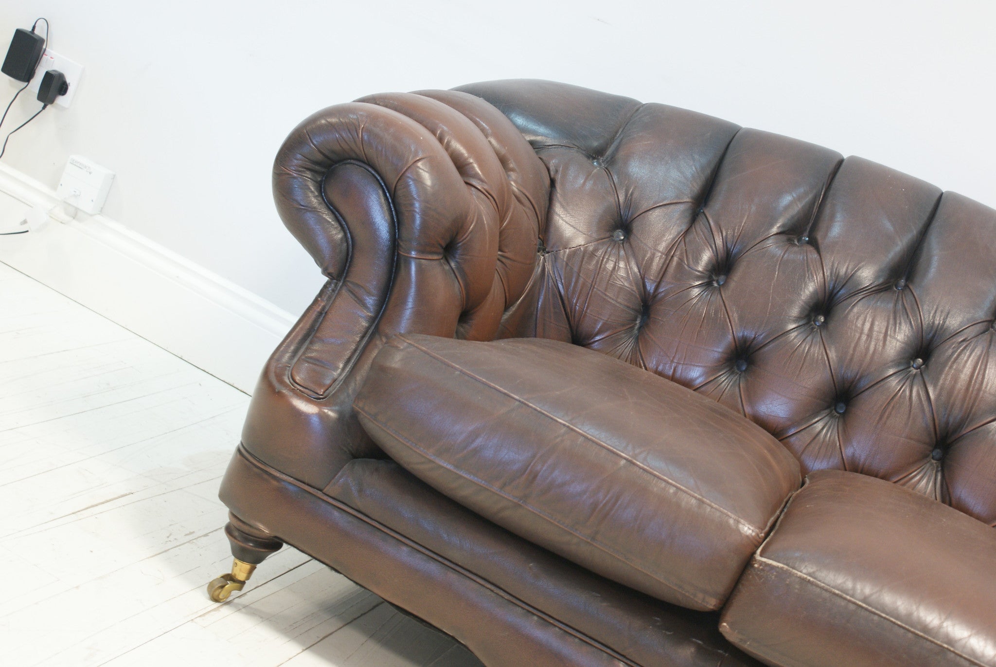 A VERY NICE PRELOVED CHESTERFIELD WITH HIGH BACK